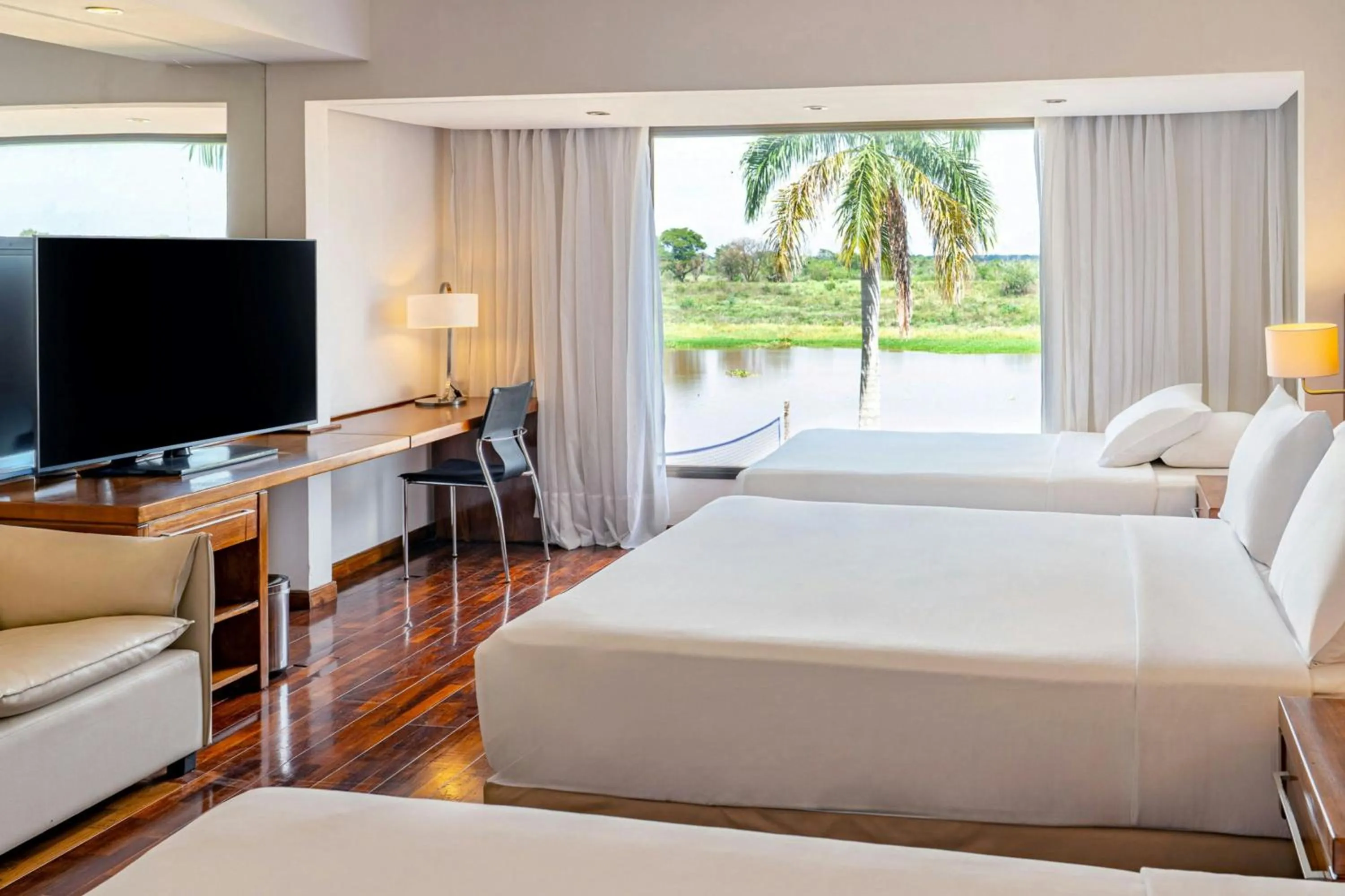 Photo of the whole room, Bed in Yacht & Golf Club Paraguayo, a Tribute Portfolio Resort