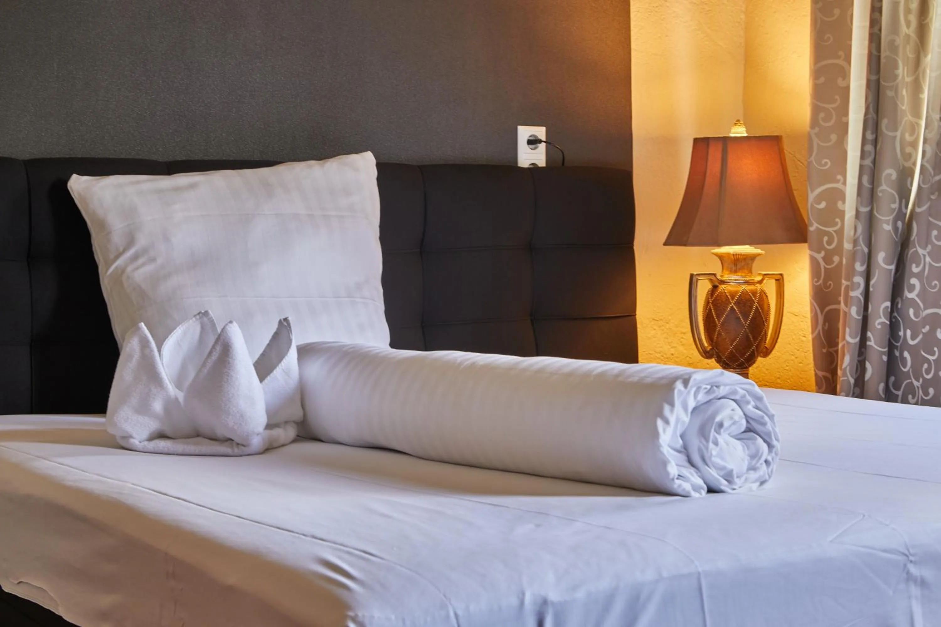 Bed in Hotel Riviera