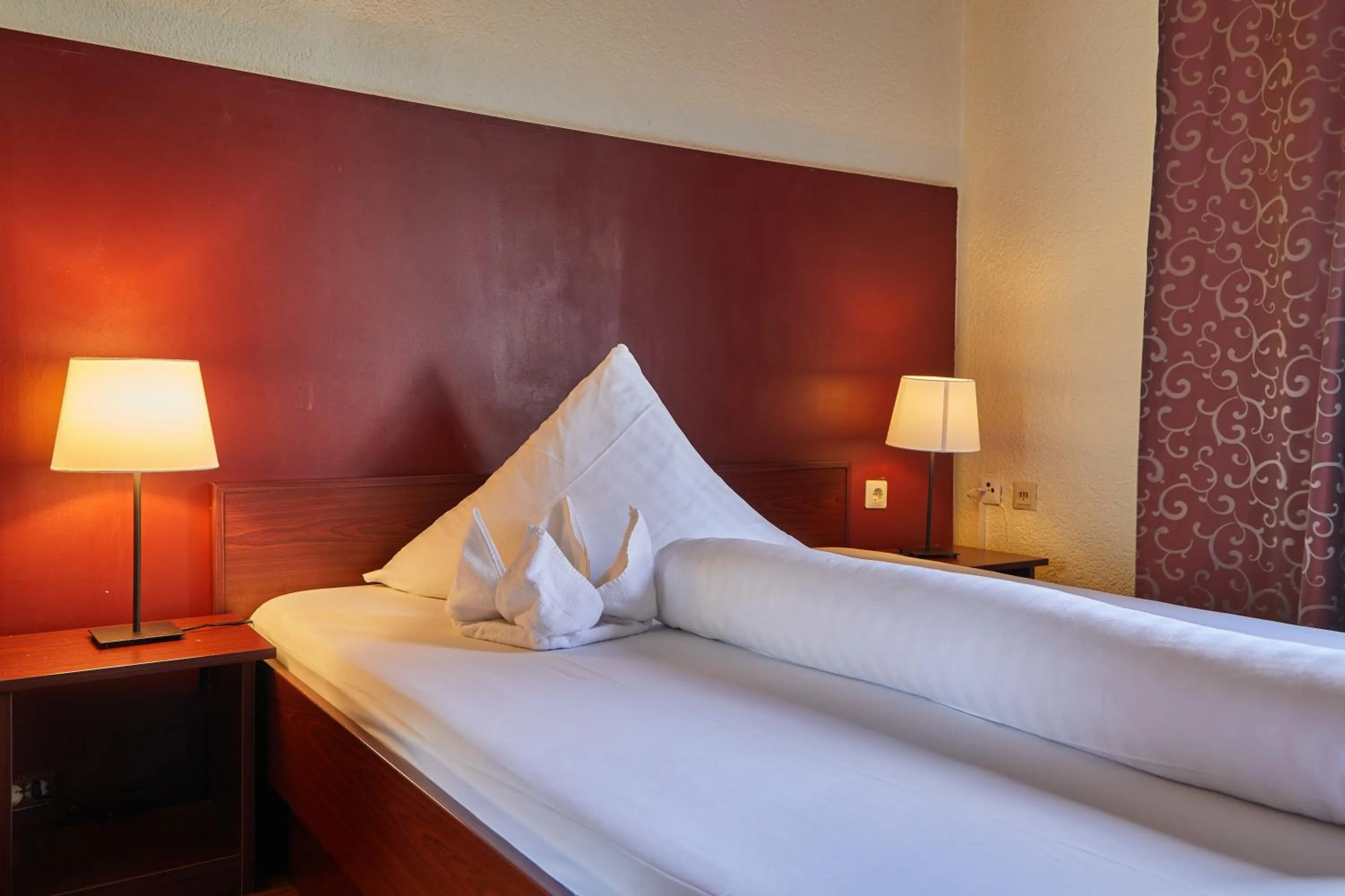 Bed in Hotel Riviera