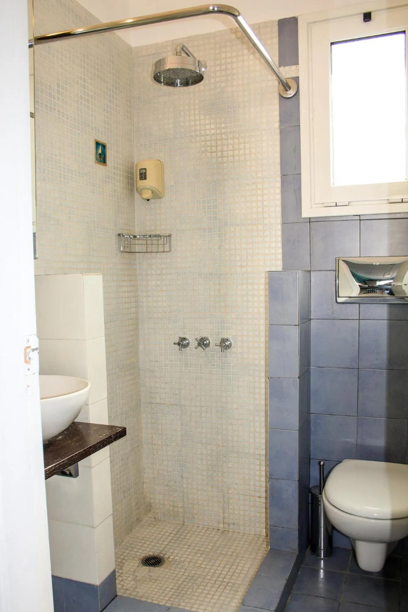 Shower in Dynasta Central Suites