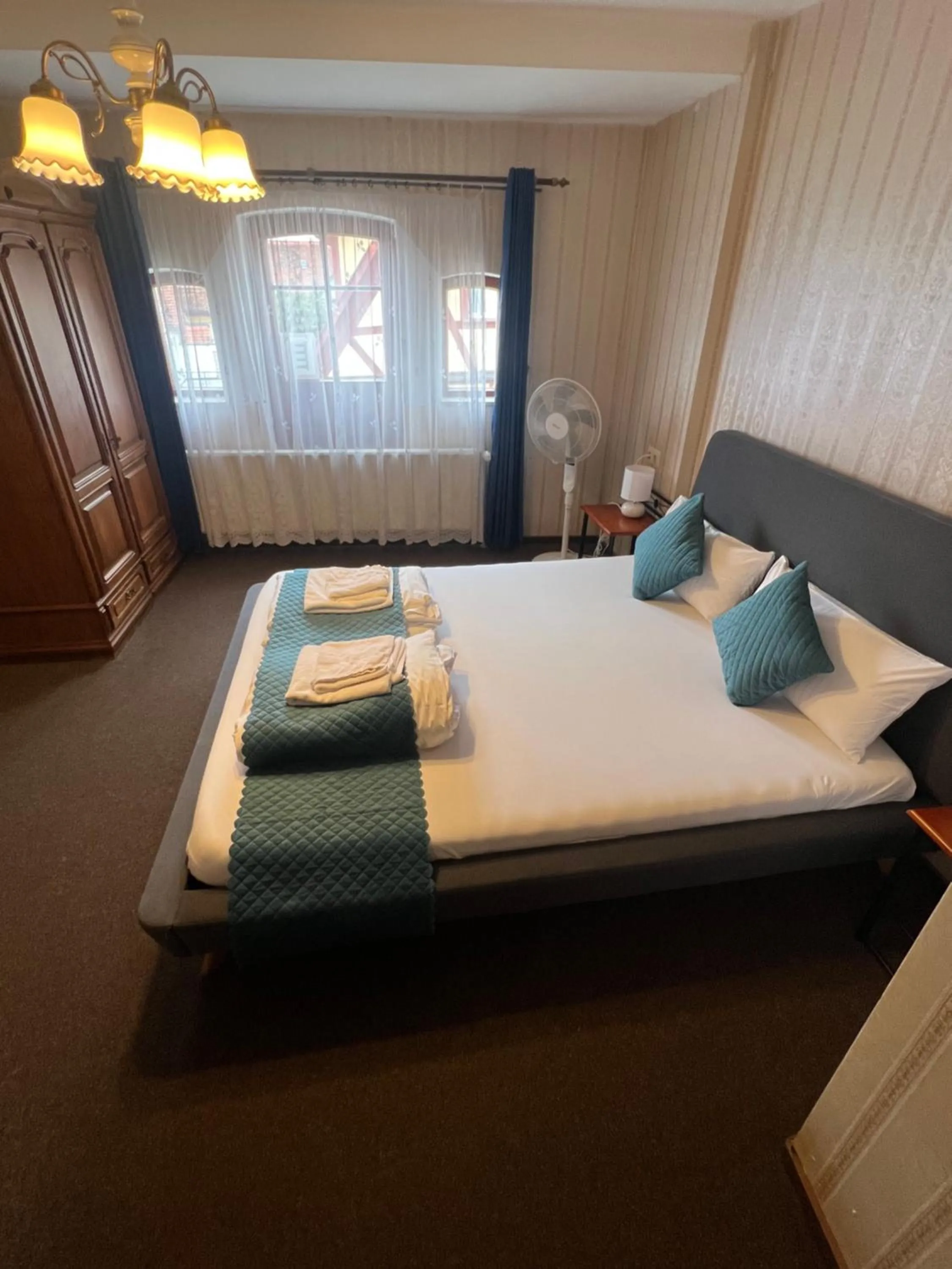 Bed in Hotel Schwarzer Adler