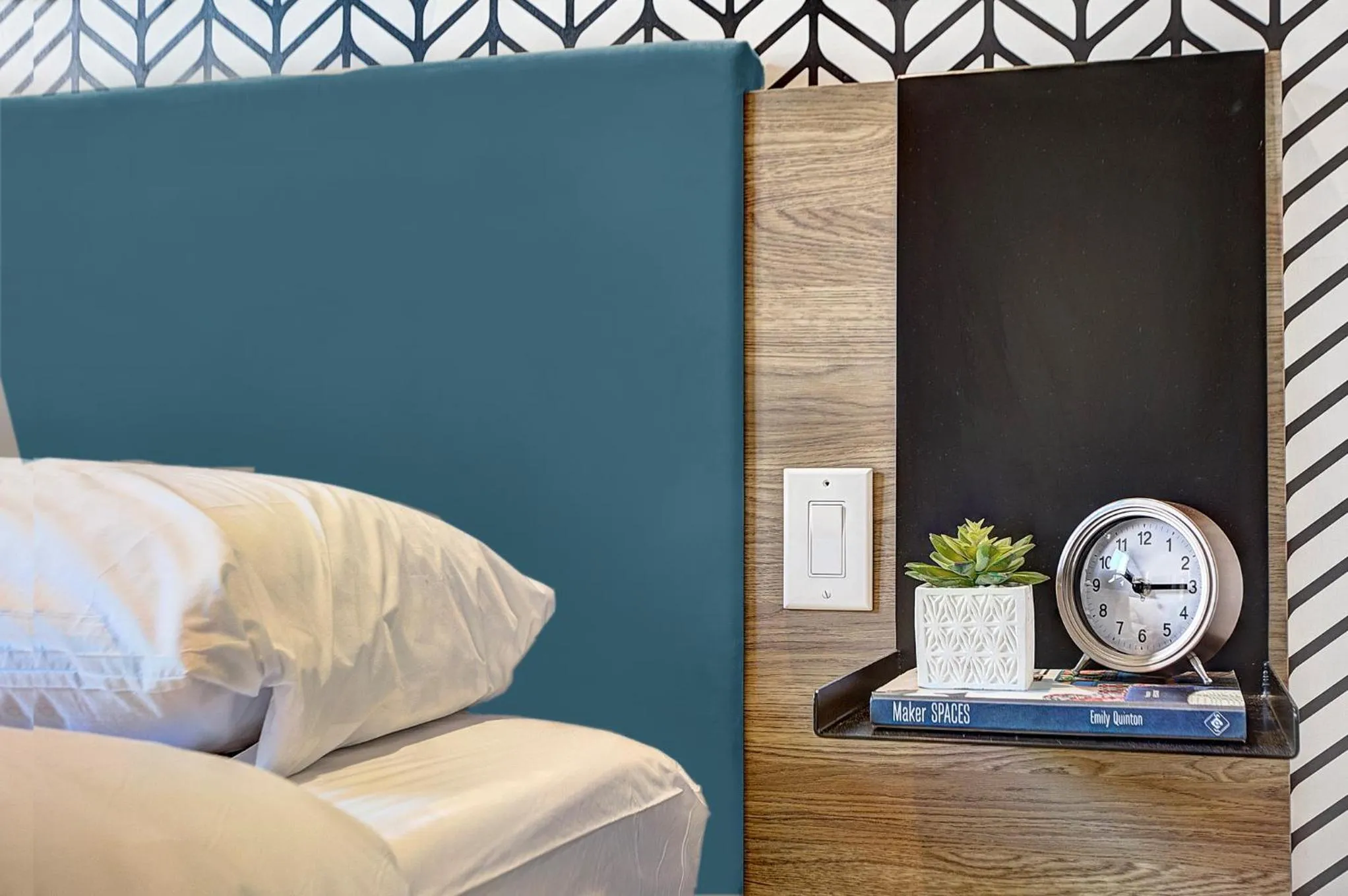 Bed in Pierce Boutique Apartments by Simplissimmo