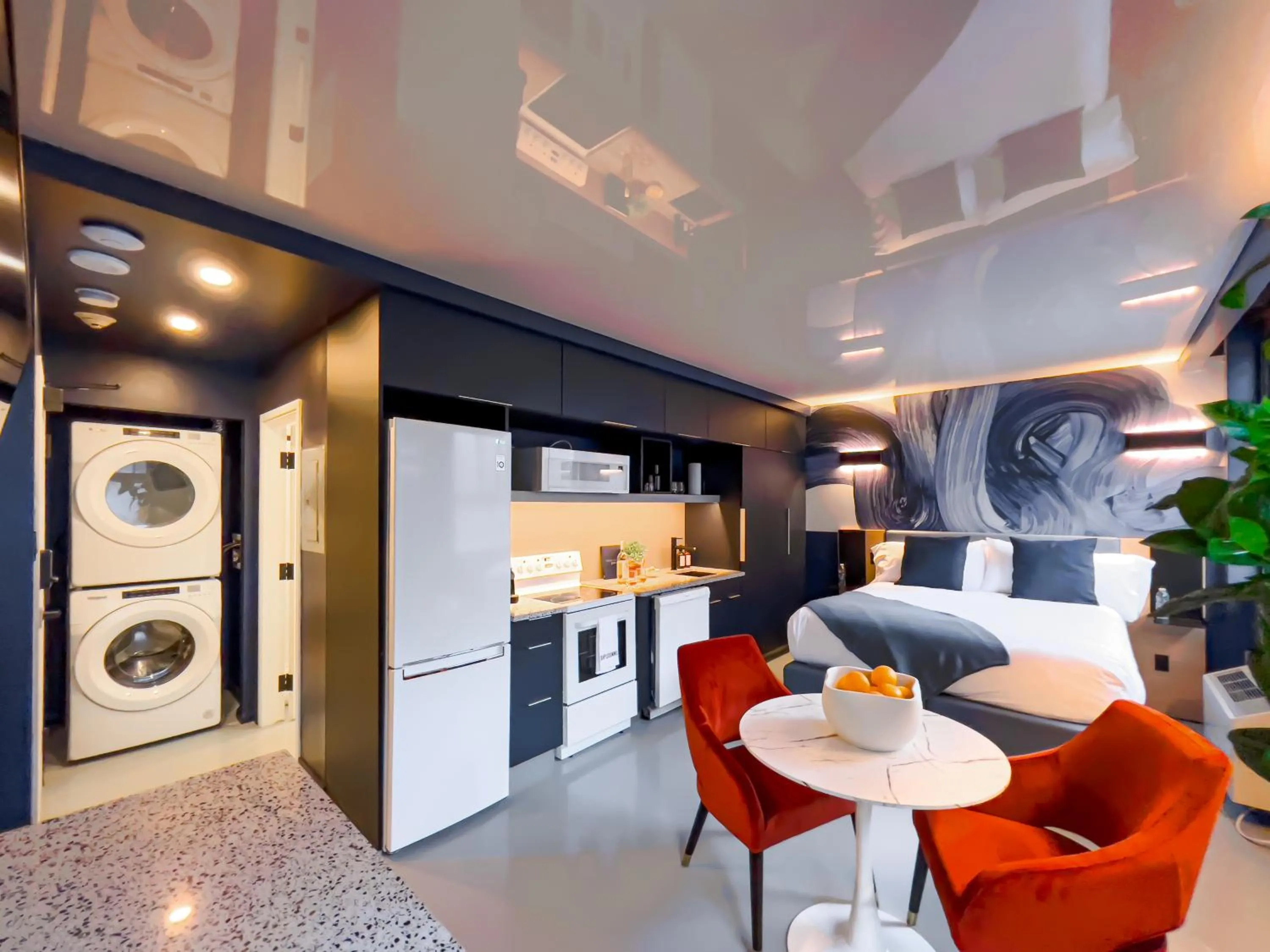 Bed in Pierce Boutique Apartments by Simplissimmo