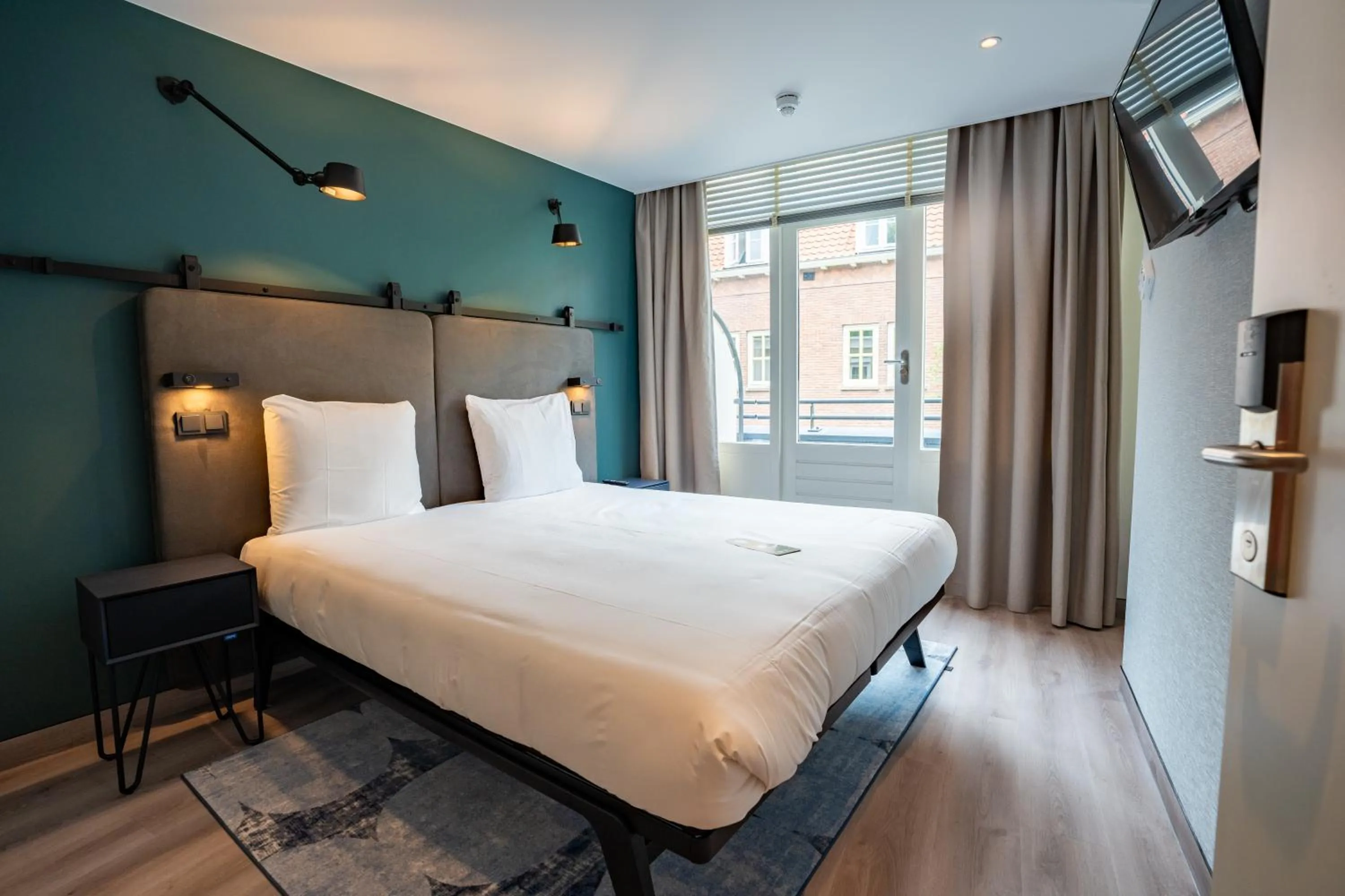 Bed in Hotel Kontakt der Kontinenten