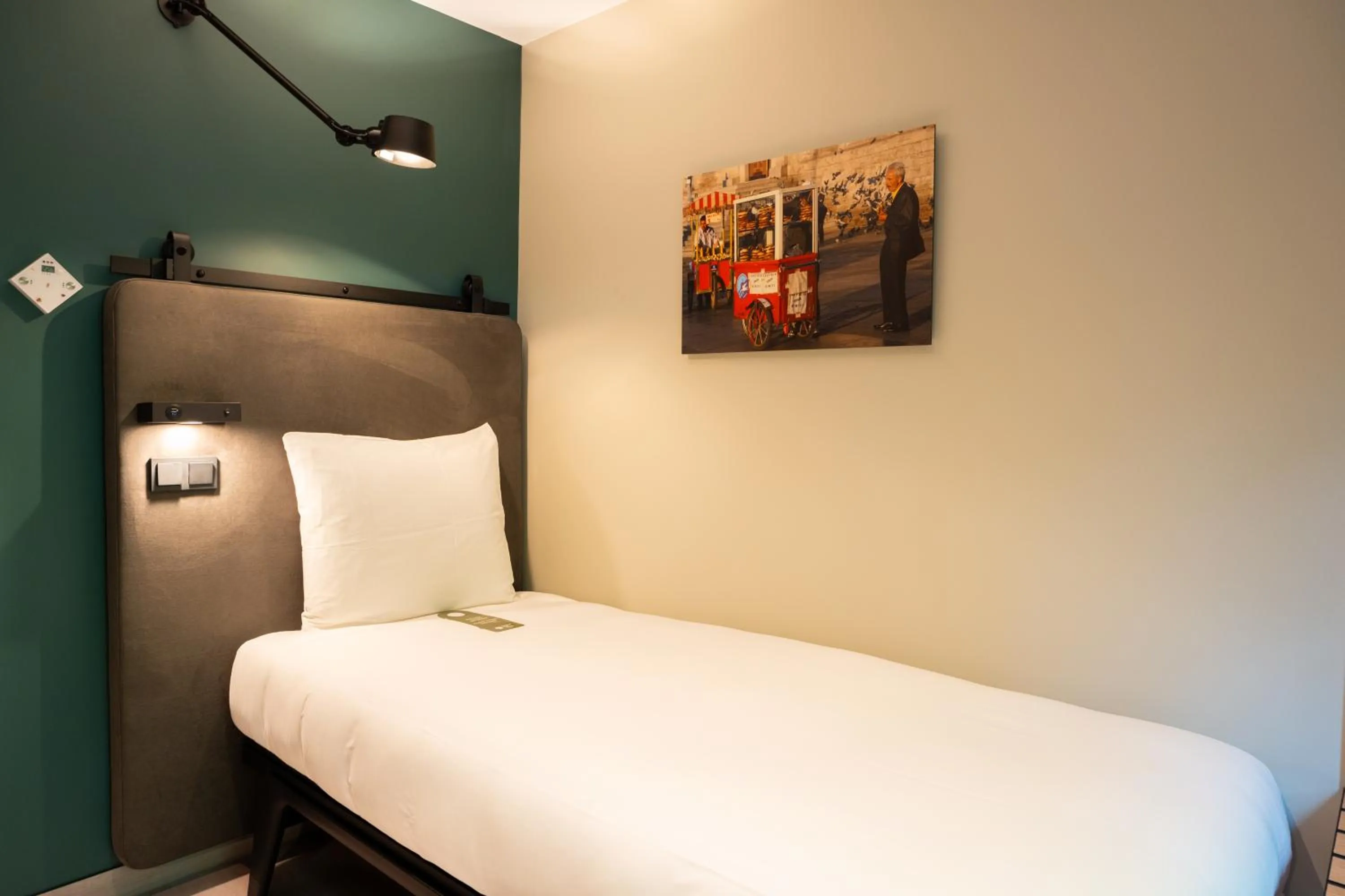 Bed in Hotel Kontakt der Kontinenten