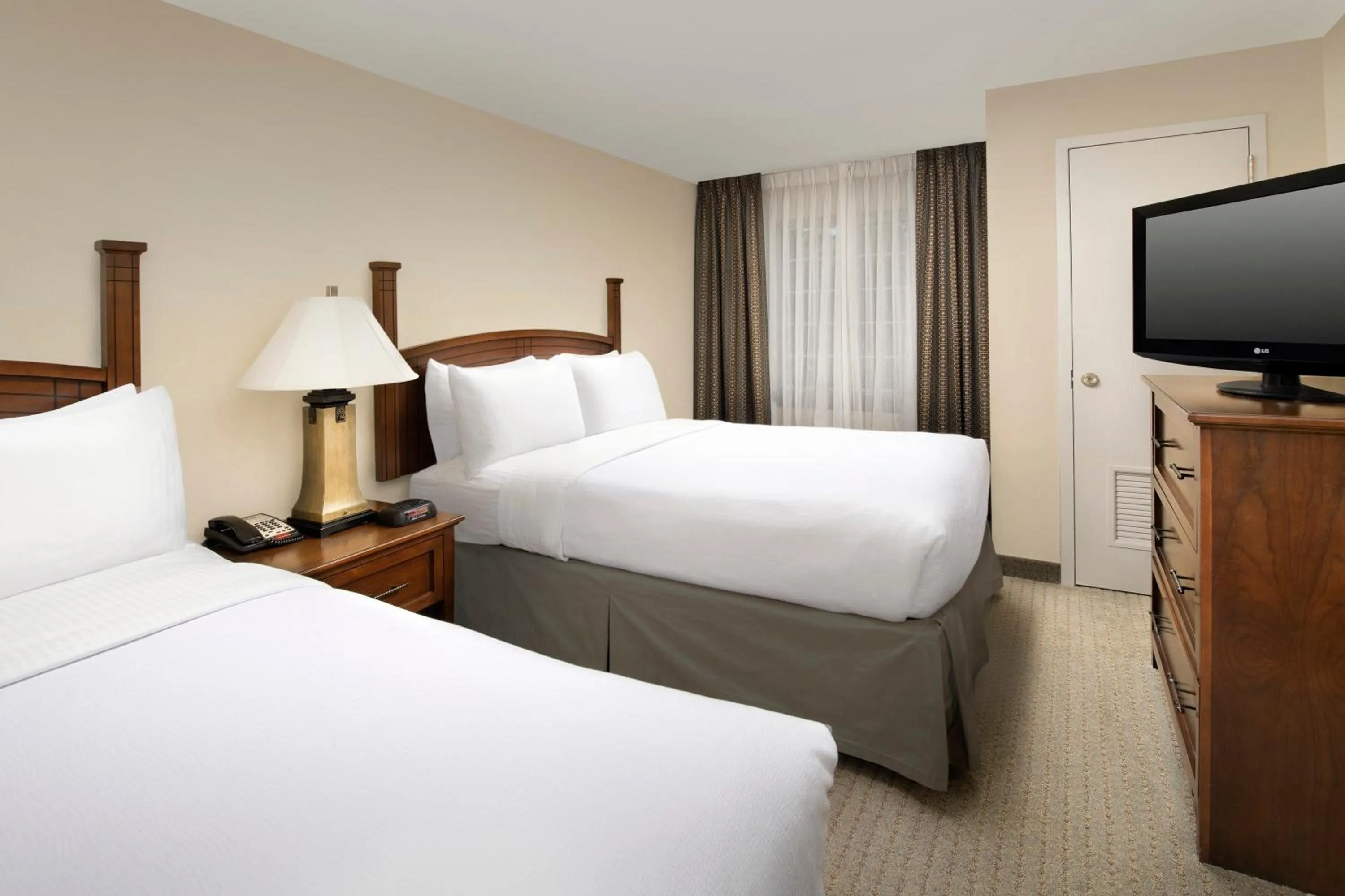 Photo of the whole room, Bed in Staybridge Suites North Brunswick by IHG
