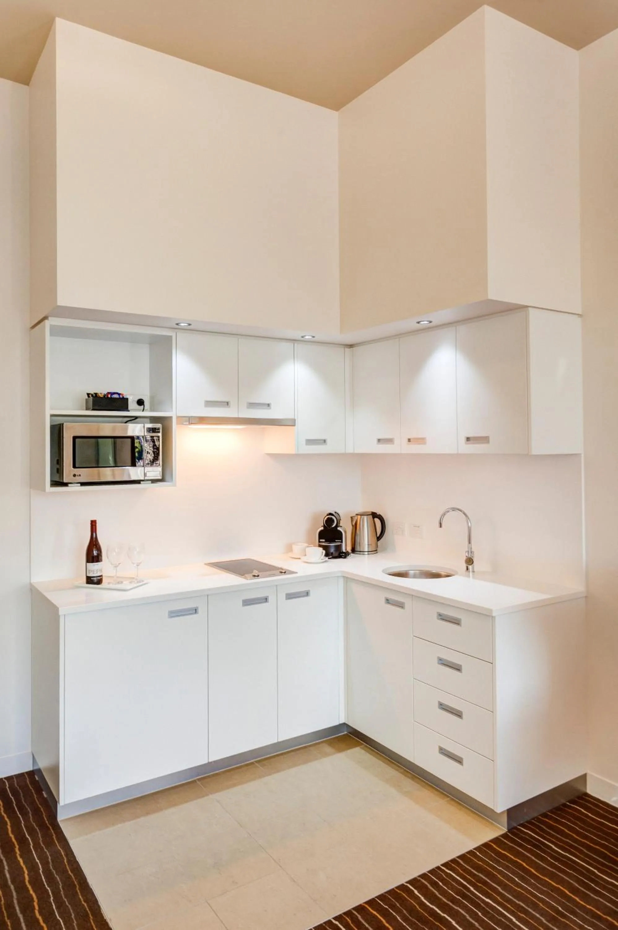 Kitchen or kitchenette in Mantra Charles Hotel