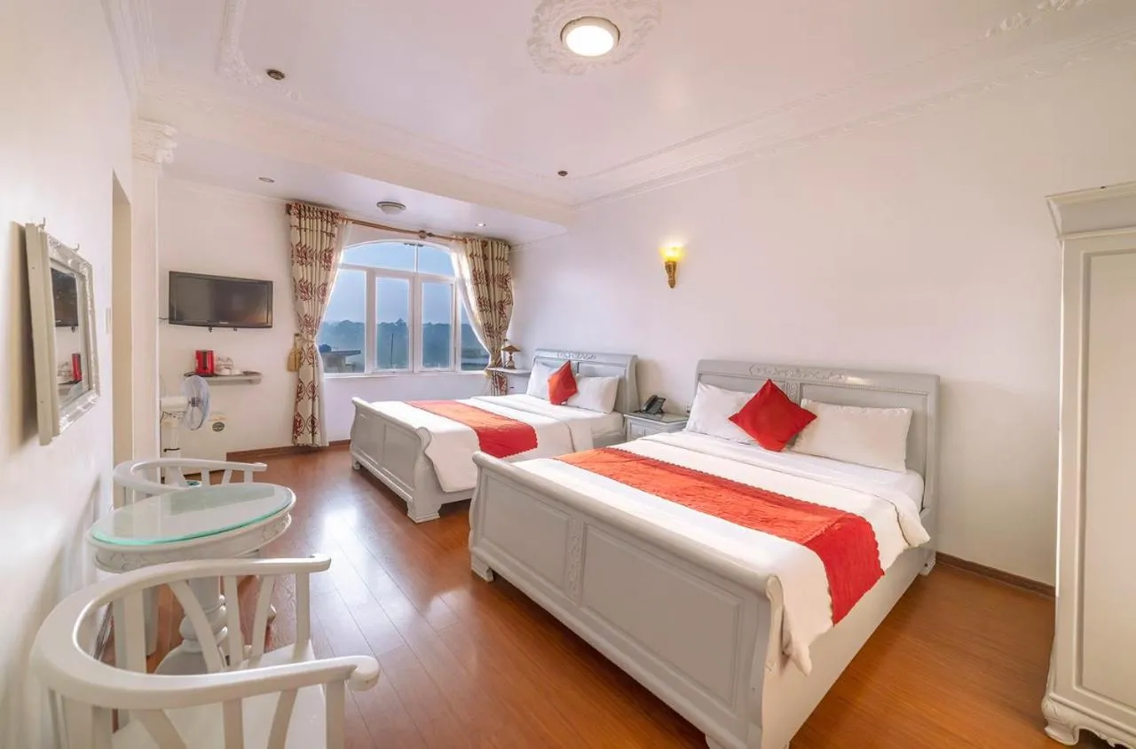 Bed in Dragon King 1 Hotel