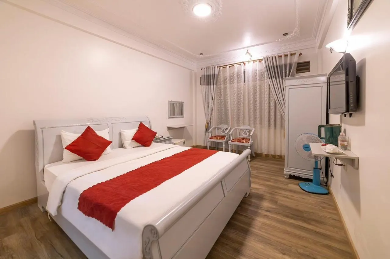 Bed in Dragon King 1 Hotel