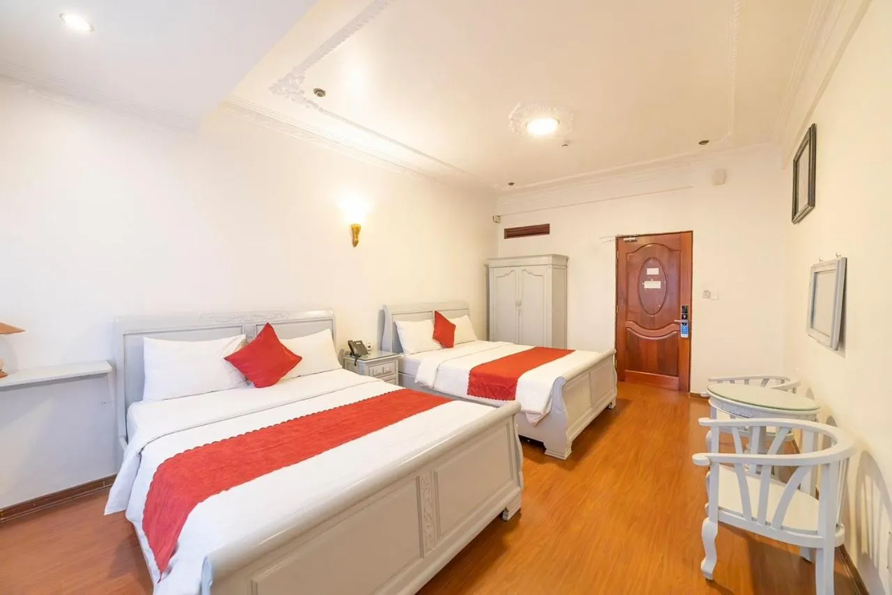 Bed in Dragon King 1 Hotel