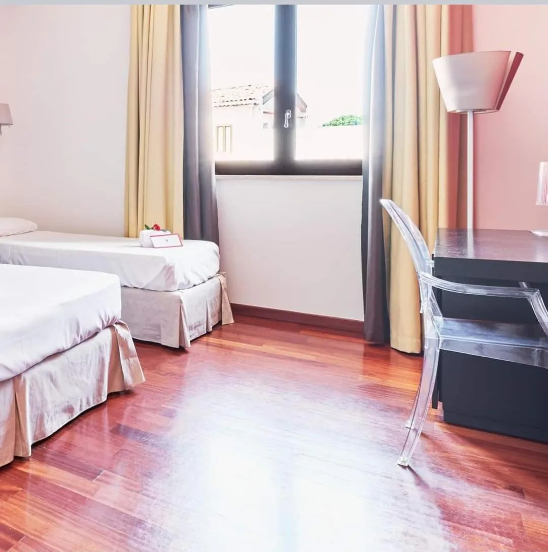 Bed in La Chicca Palace Hotel