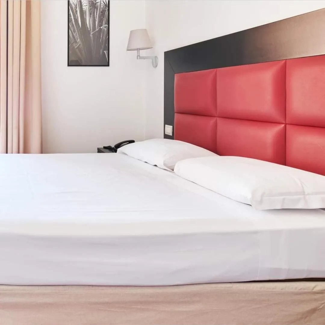 Bed in La Chicca Palace Hotel