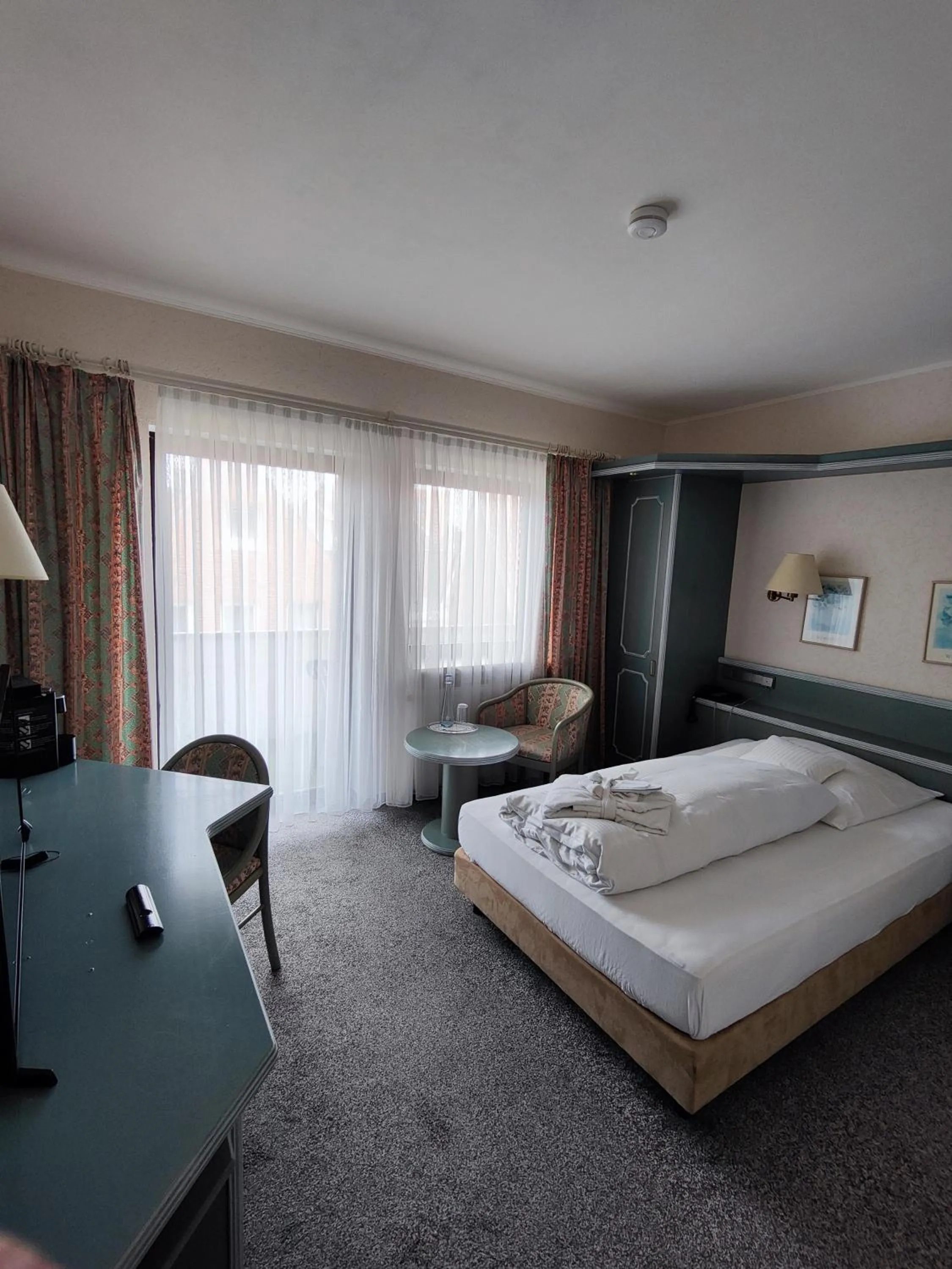 Living room, Bed in Nordseehotel Freese