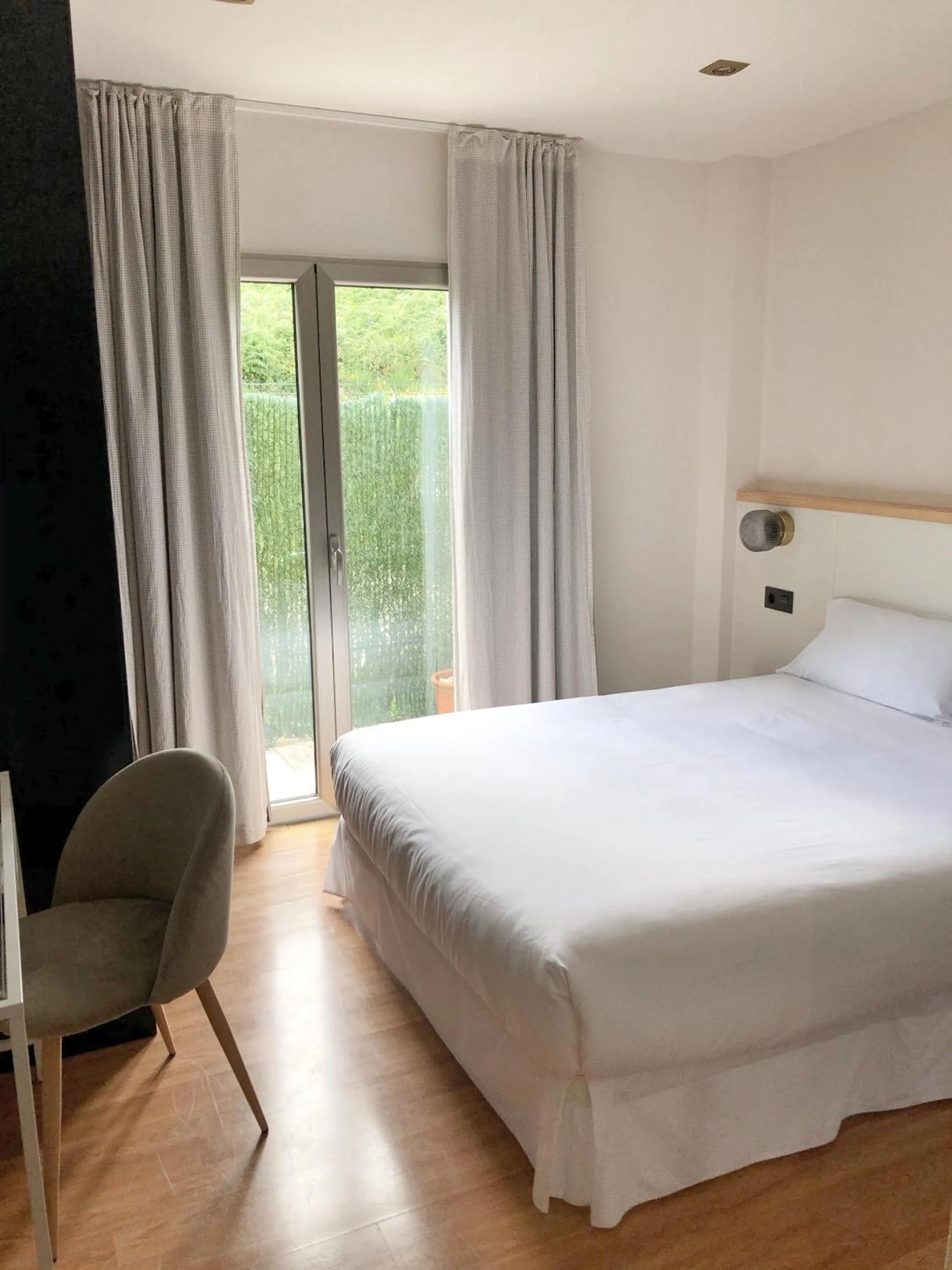 Bed in Hotel As Hortensias