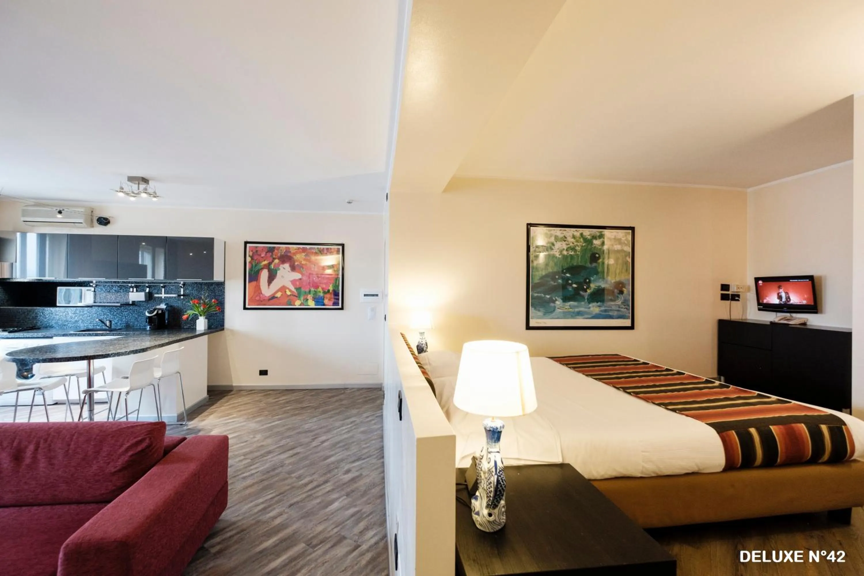 Communal lounge/ TV room, Bed in Residence Sacchi Aparthotel