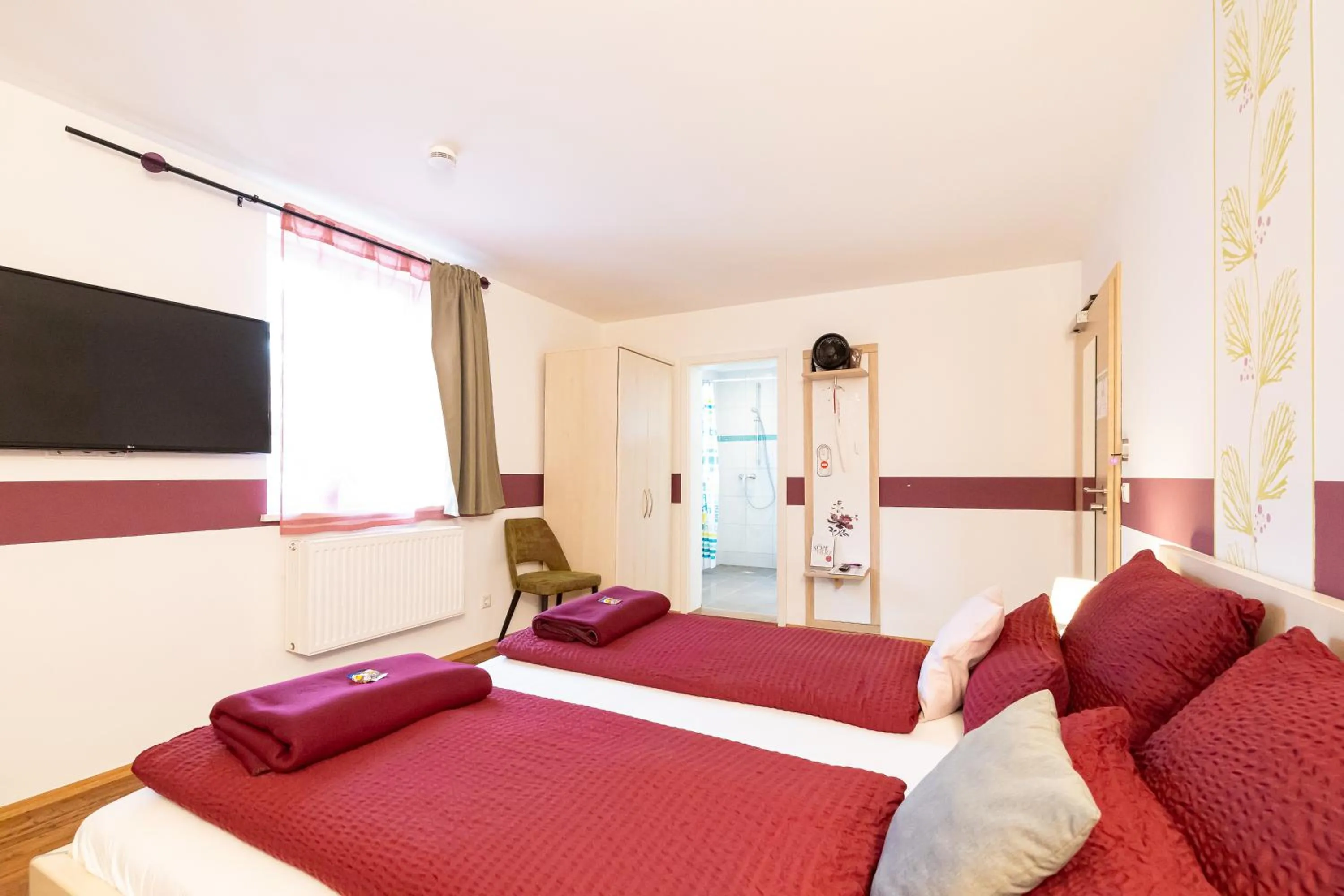 Bed in Hotel DAH-Inn