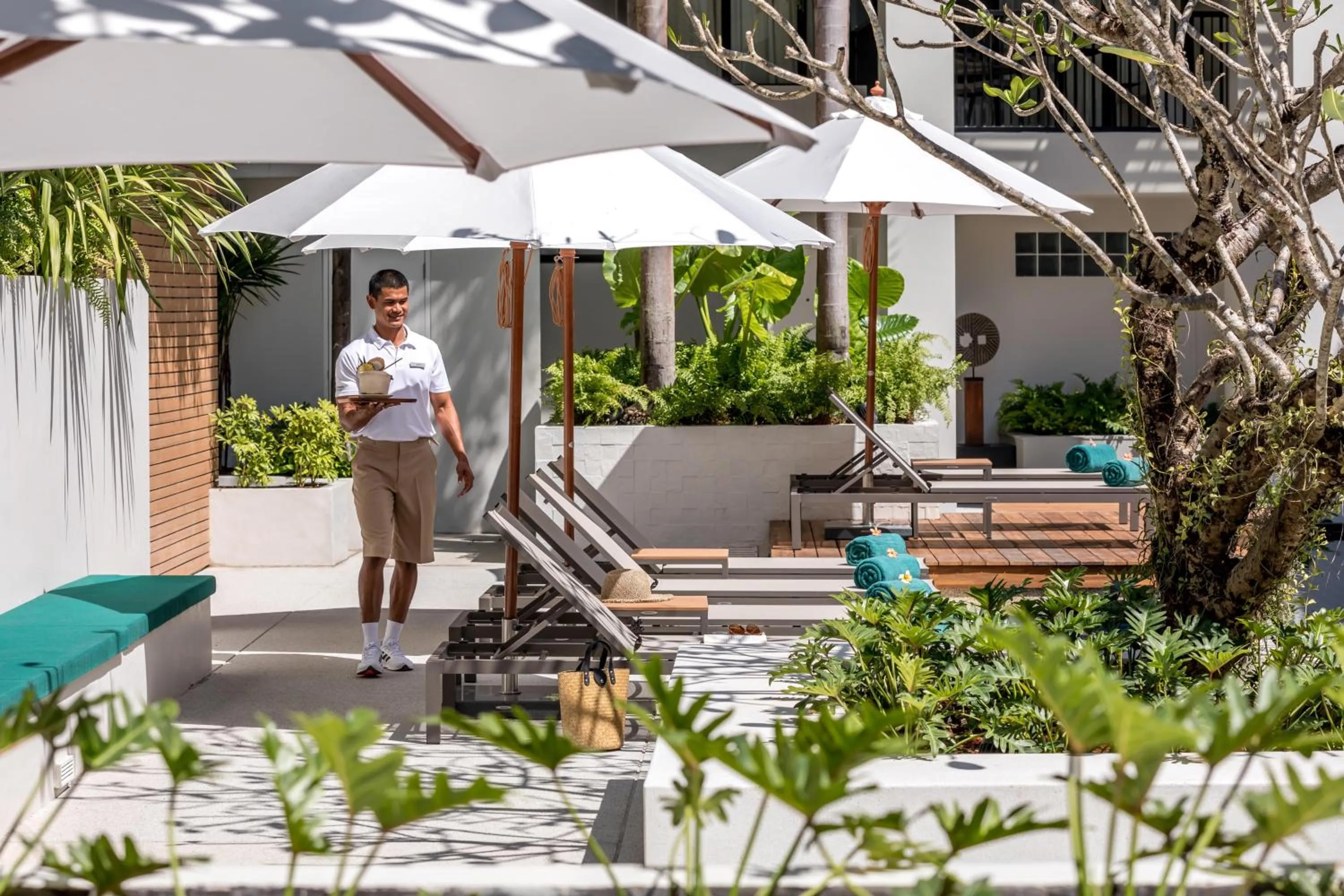 Swimming pool in OUTRIGGER Surin Beach Resort