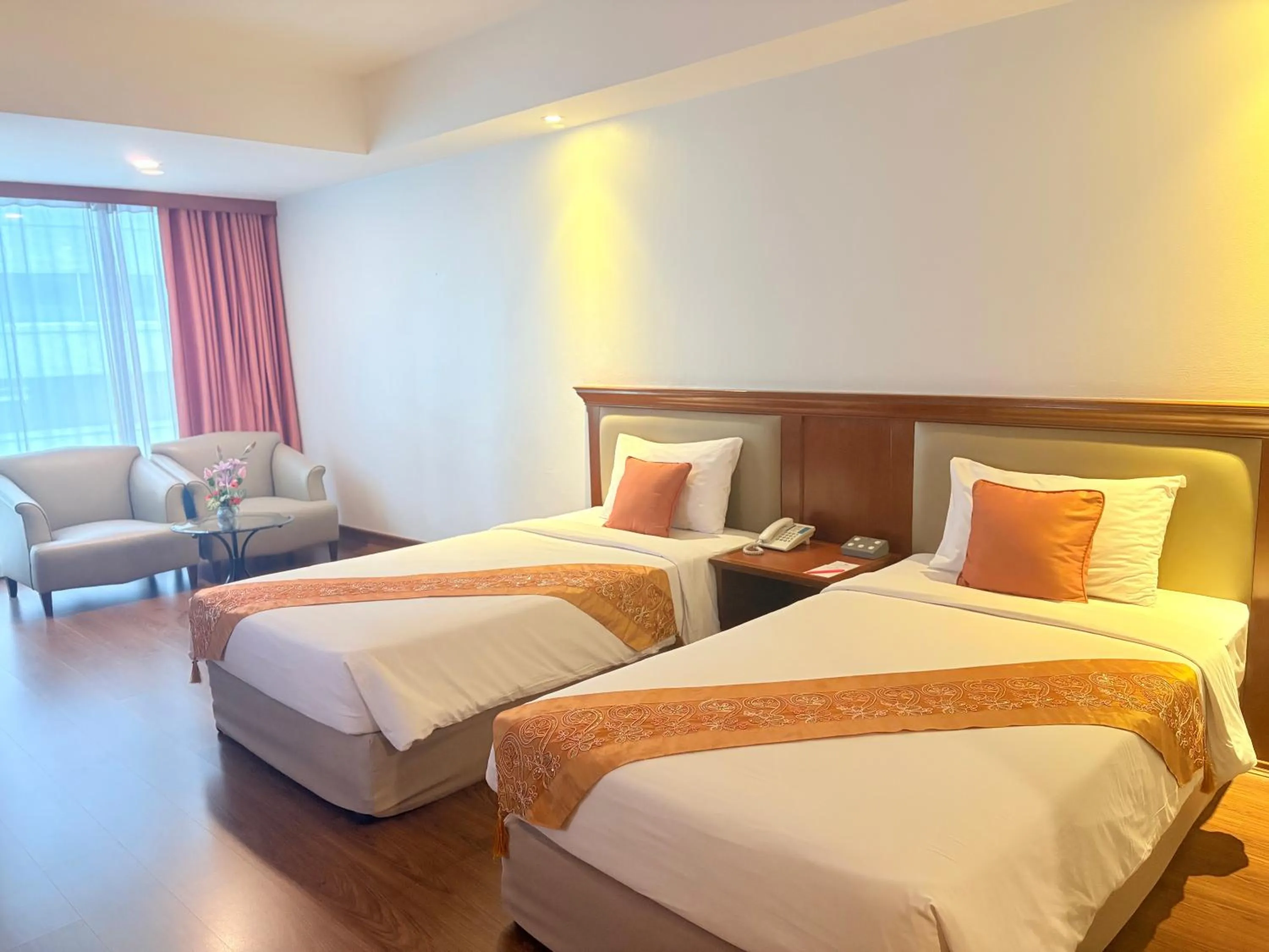 Bed in Tai Pan Hotel