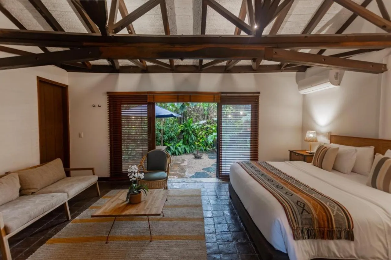 Photo of the whole room, Bed in Sazagua Hotel Boutique