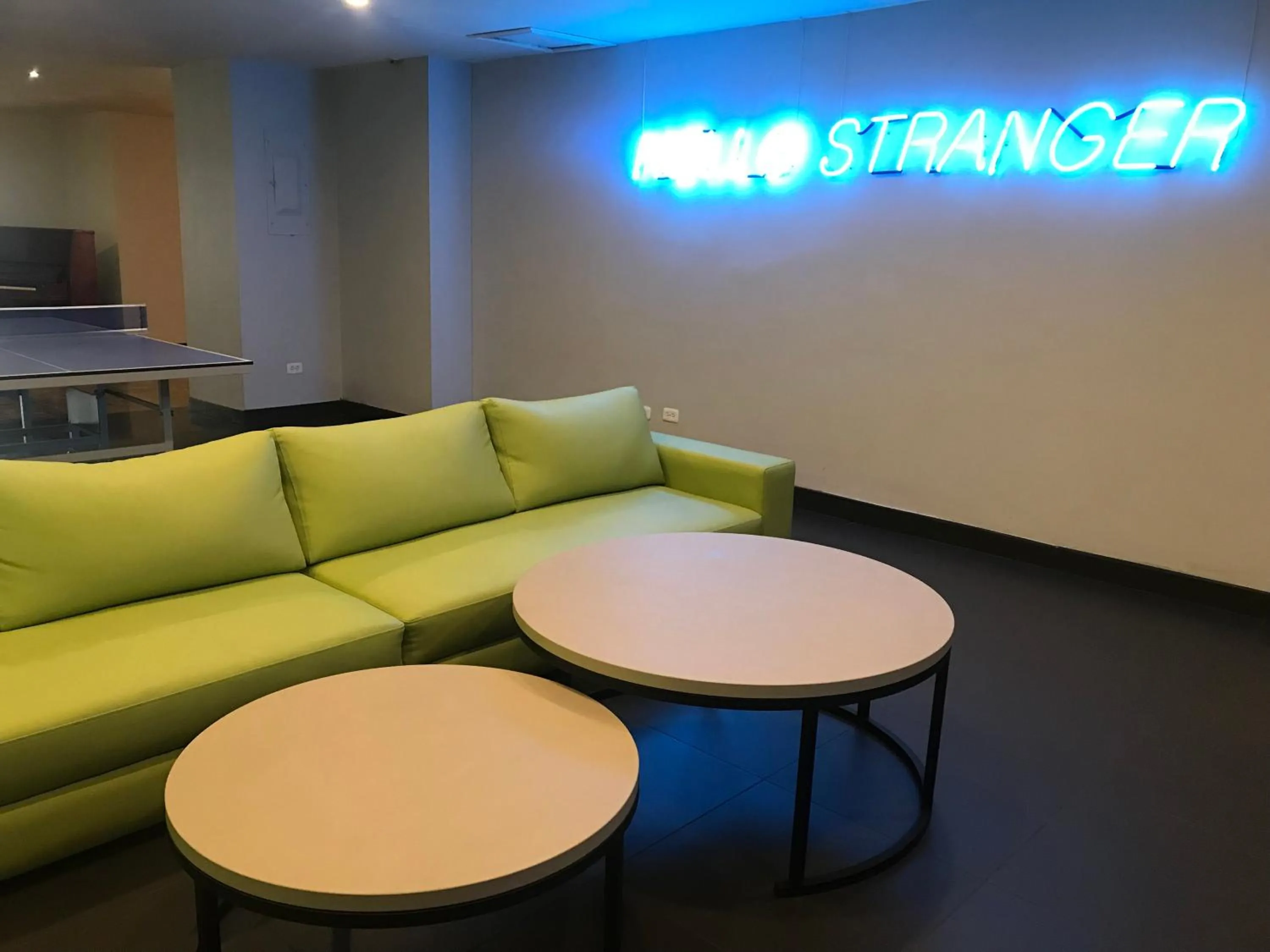 Communal lounge/ TV room in Pop Art Hotel Las Colinas Manizales