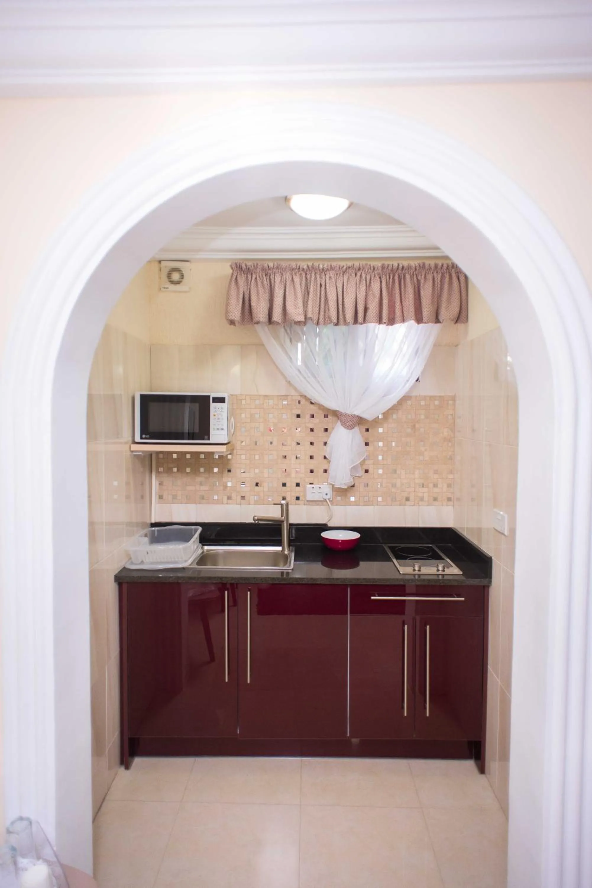 Kitchen or kitchenette in The Ritzz Exclusive Guest House