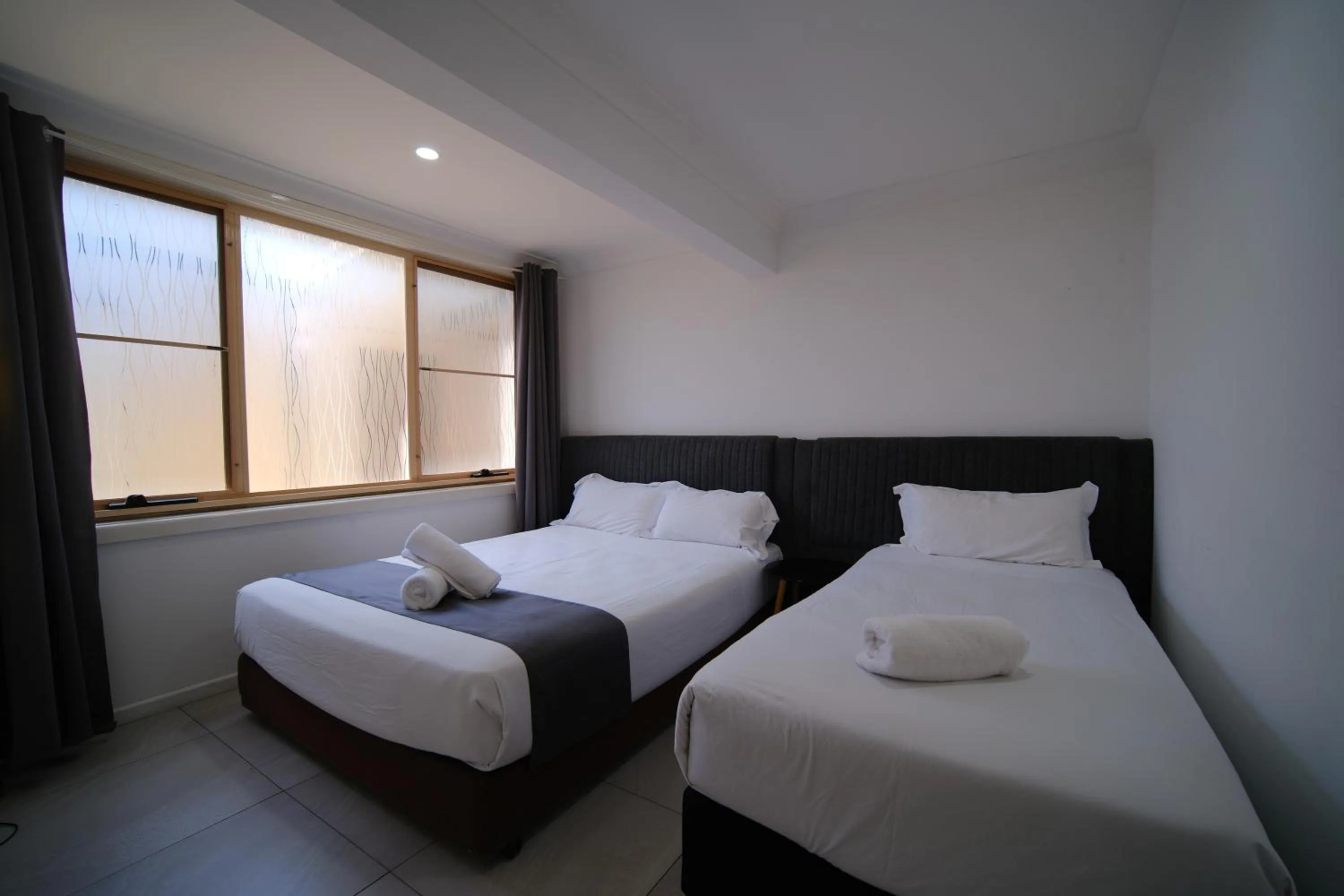 Bed in Golf Place Inn Wollongong