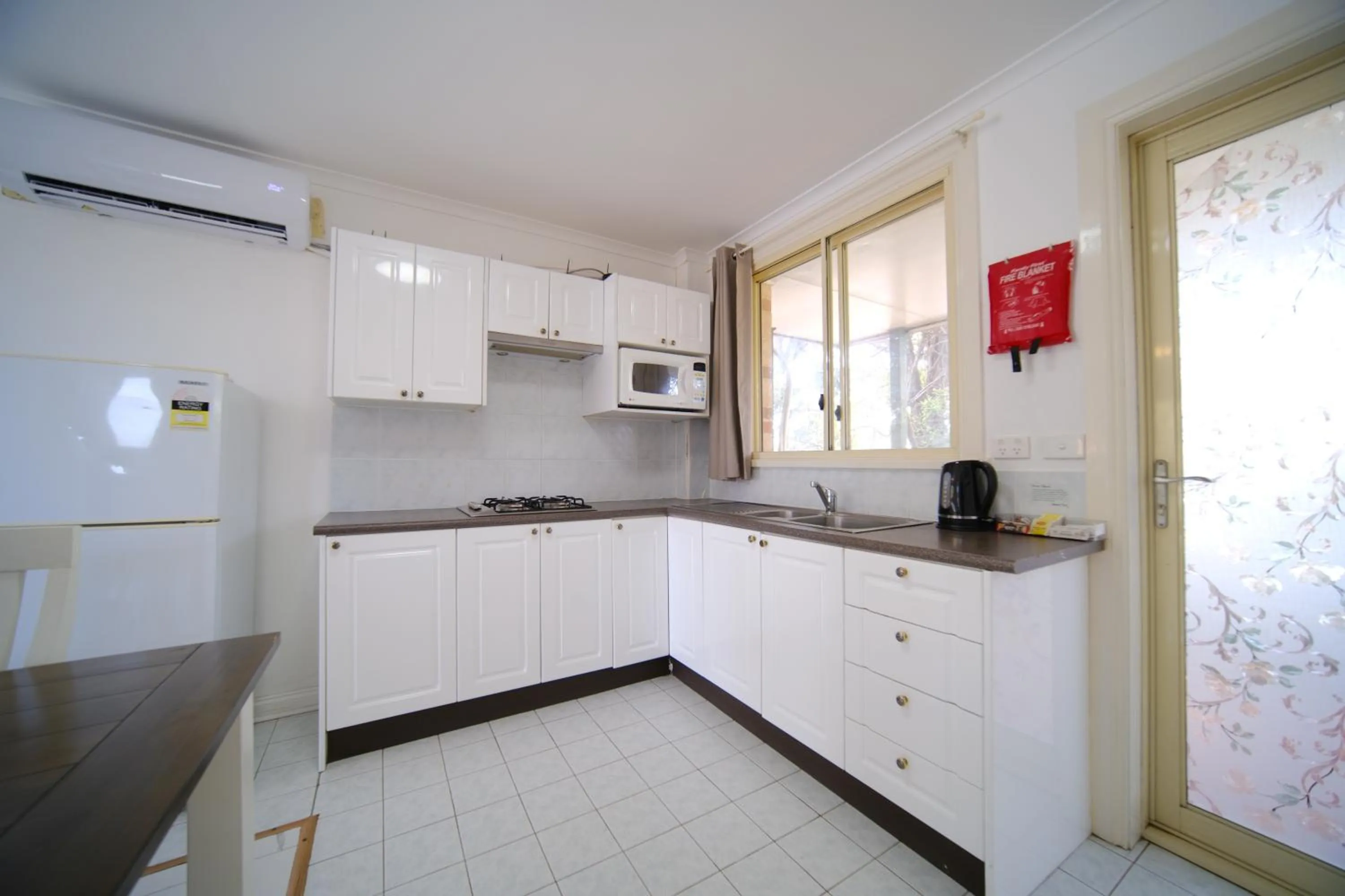 Kitchen or kitchenette in Golf Place Inn Wollongong