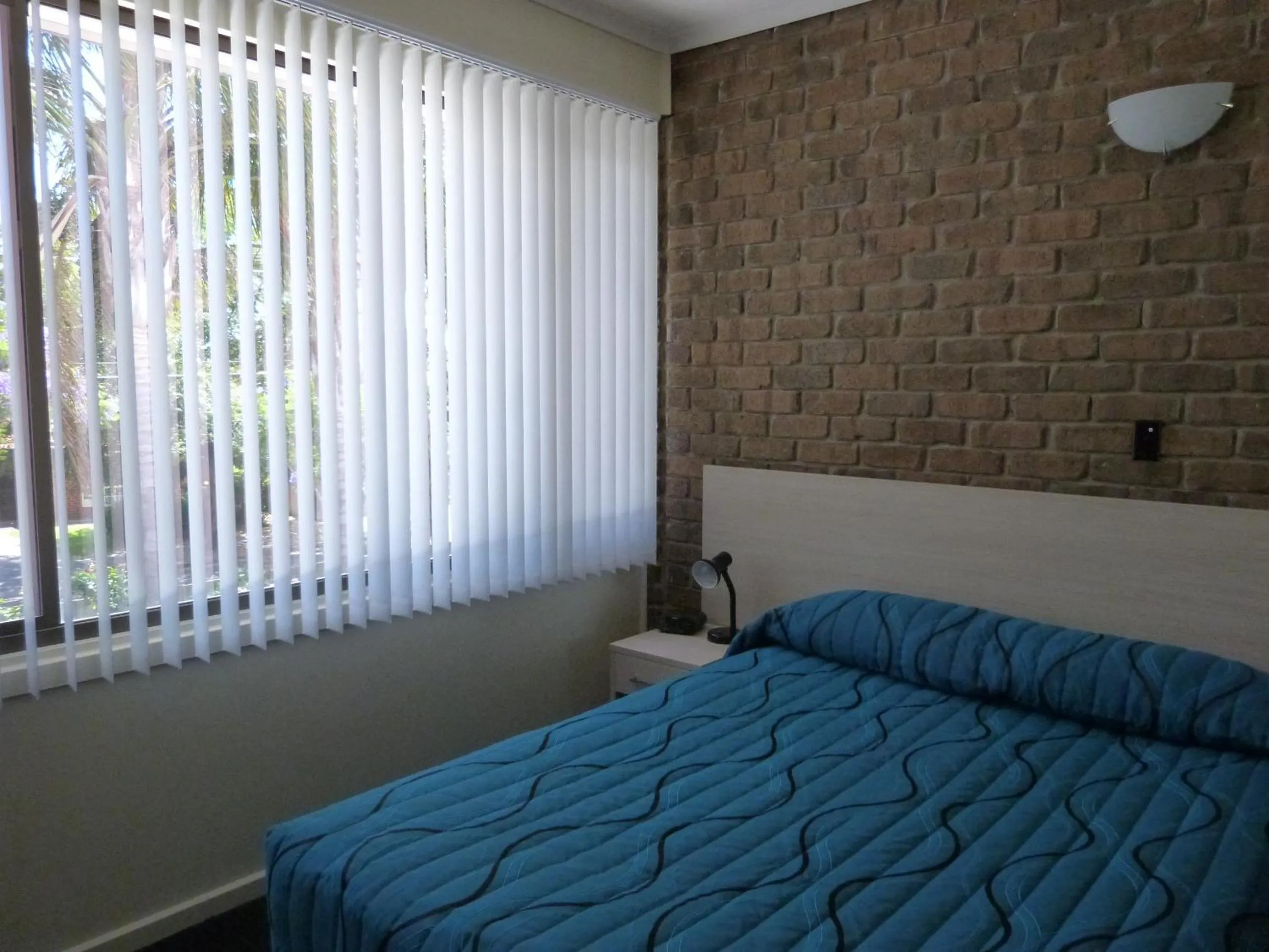 Bed in Marion Motel and Apartments