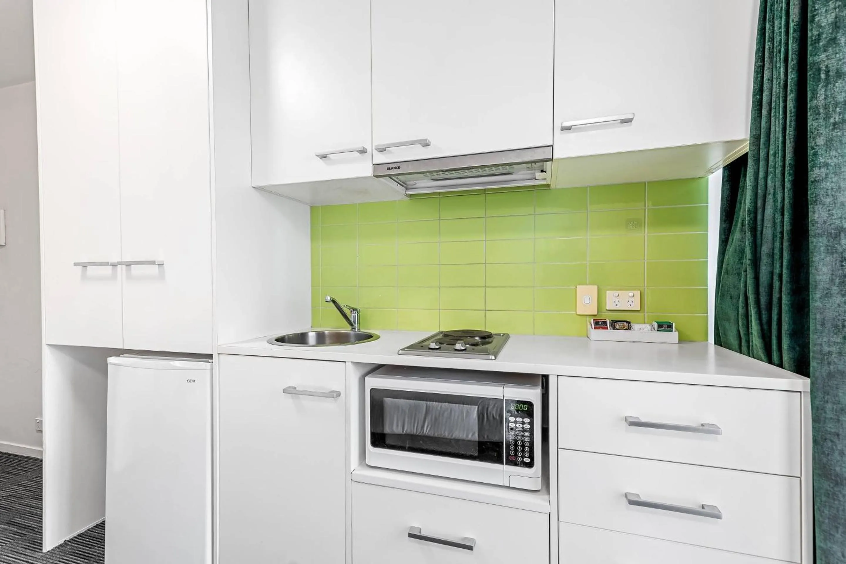 Bedroom in Quality Apartments North Melbourne