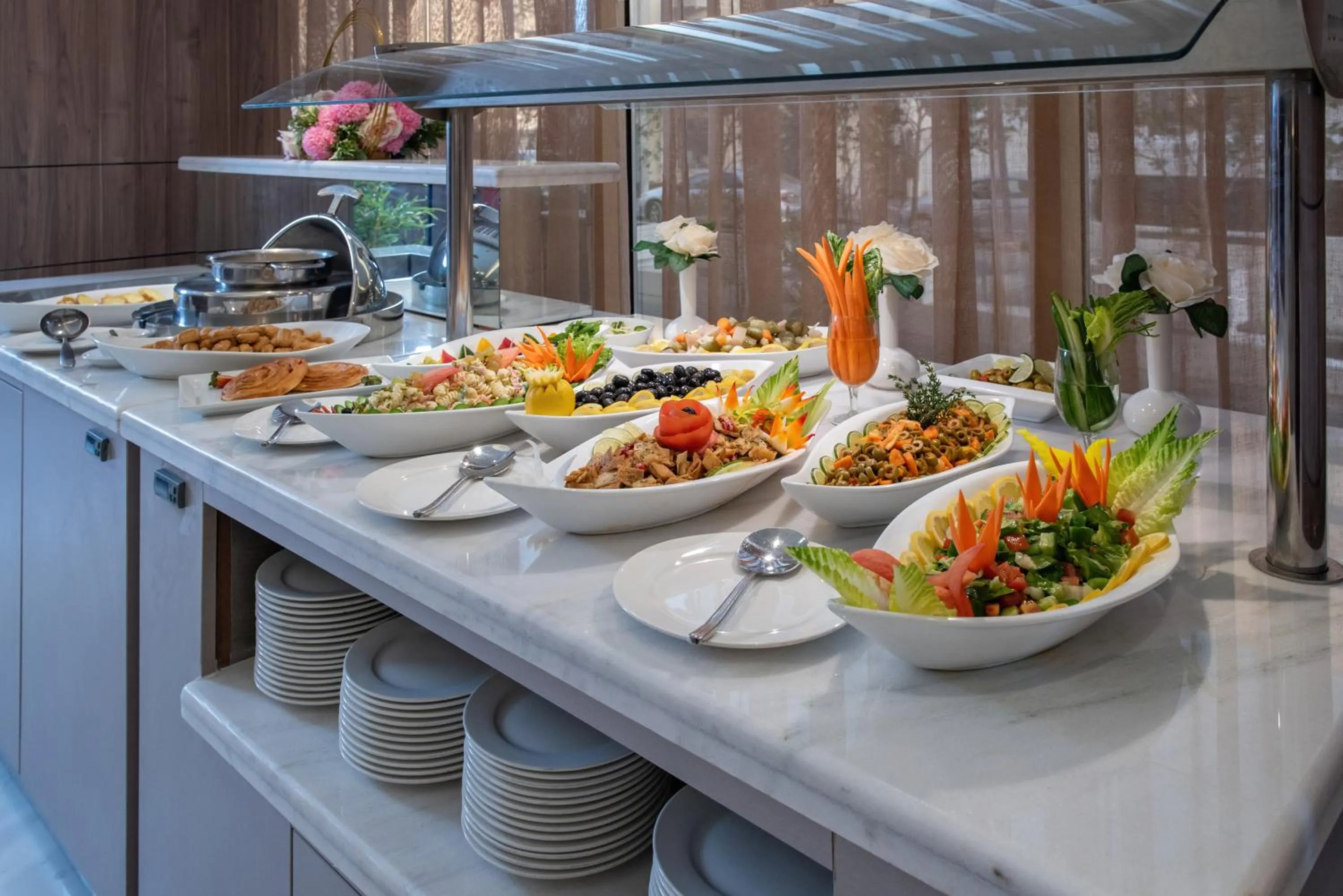 Buffet breakfast in Corp Executive Hotel Doha Suites