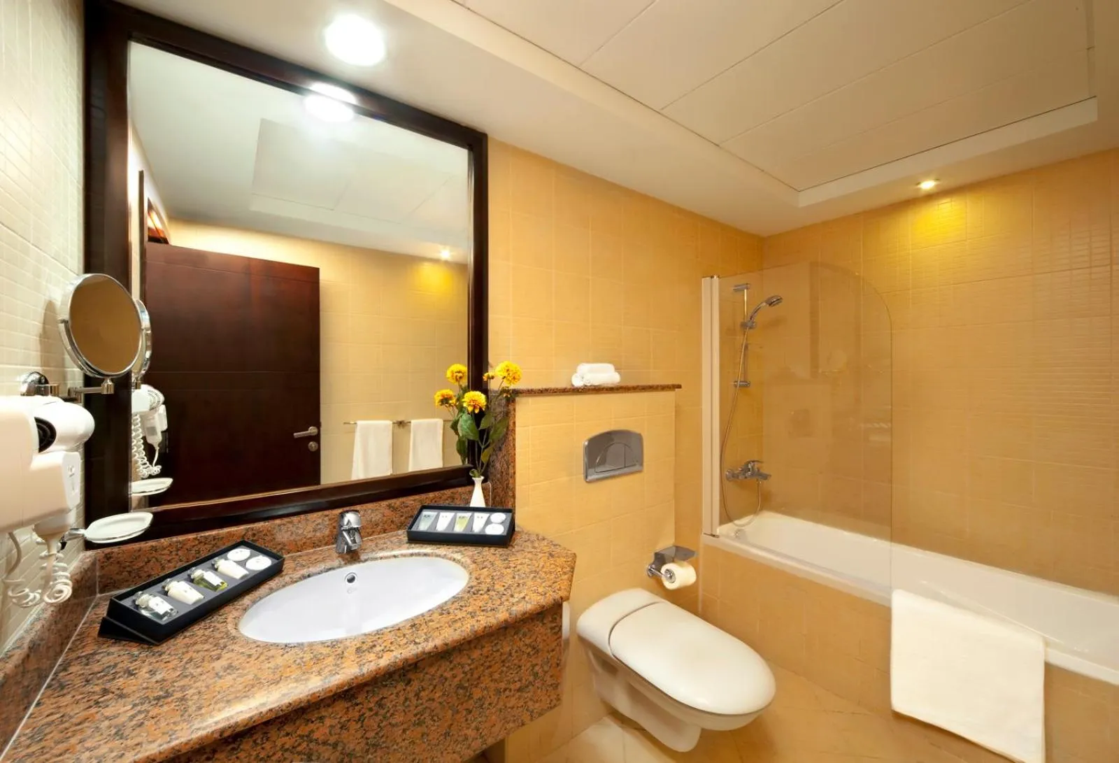 Shower in Corp Executive Hotel Doha Suites