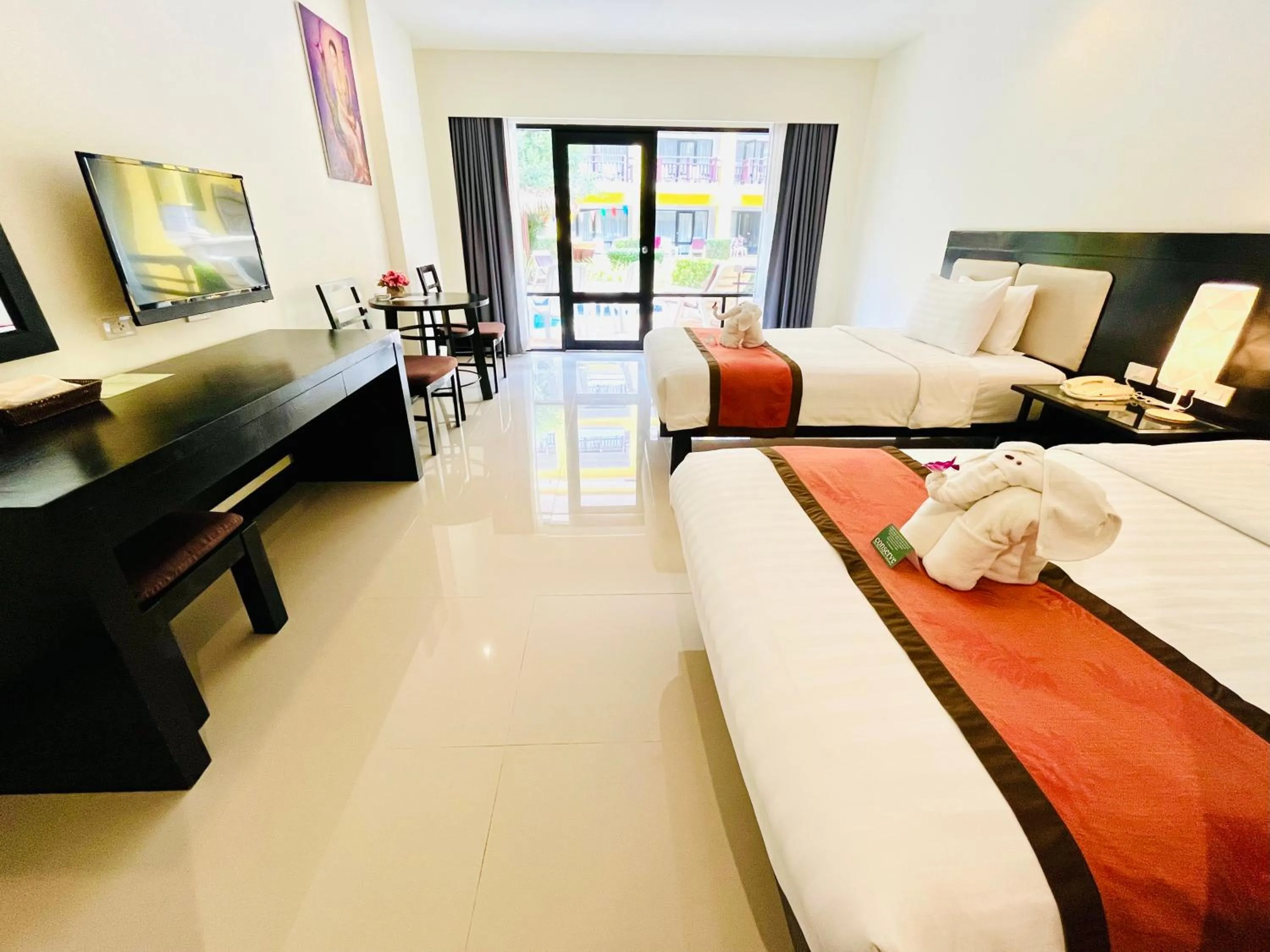 Bed in Woraburi Phuket Resort & Spa - SHA Plus