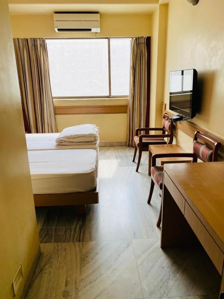 Bed in Hotel Midland