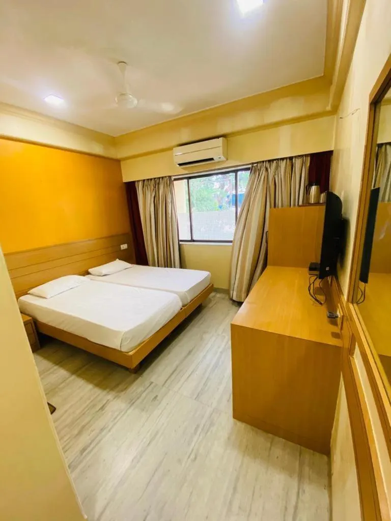 Bed in Hotel Midland