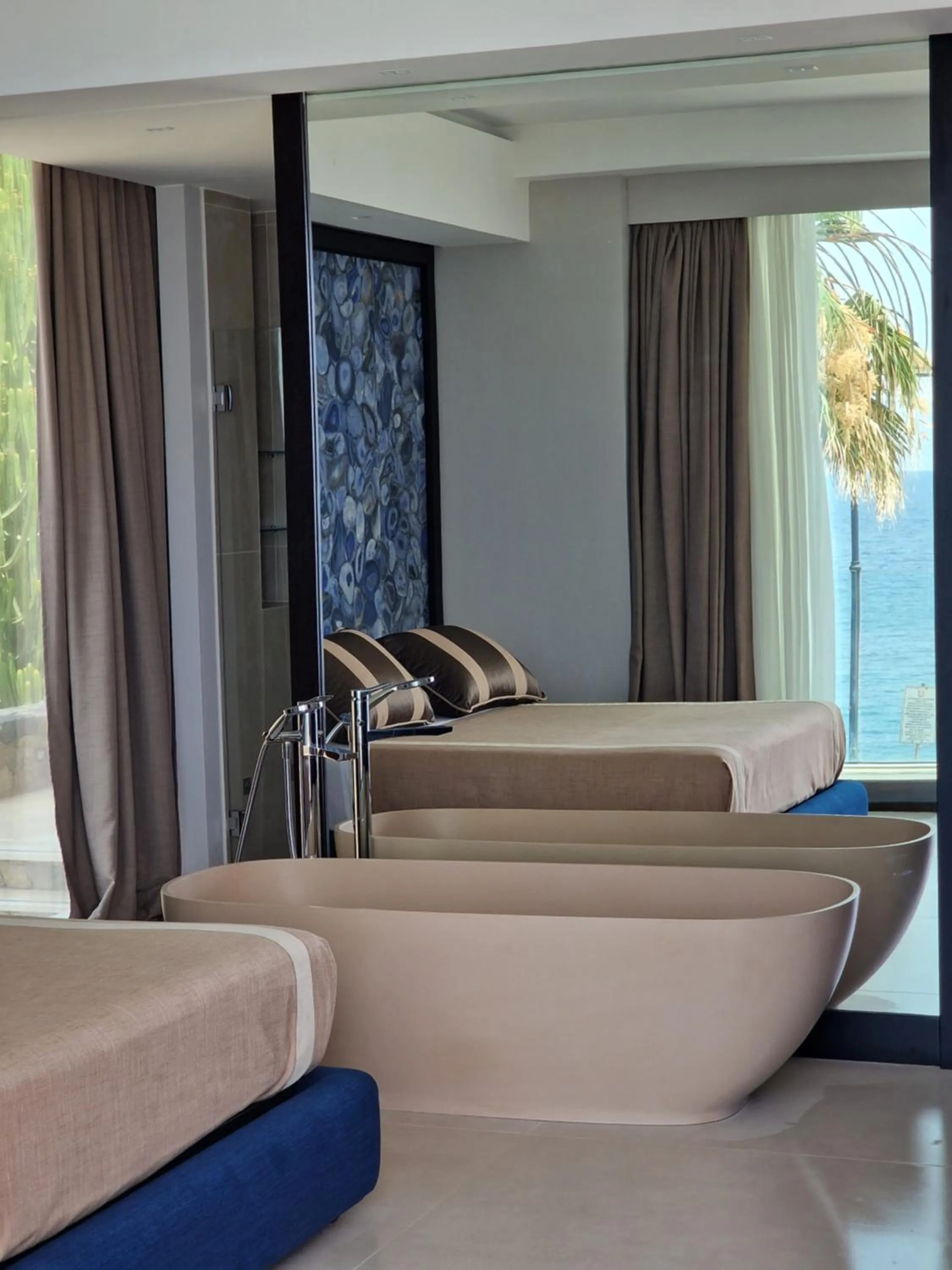 Bed in Ngonia Bay Boutique Hotel