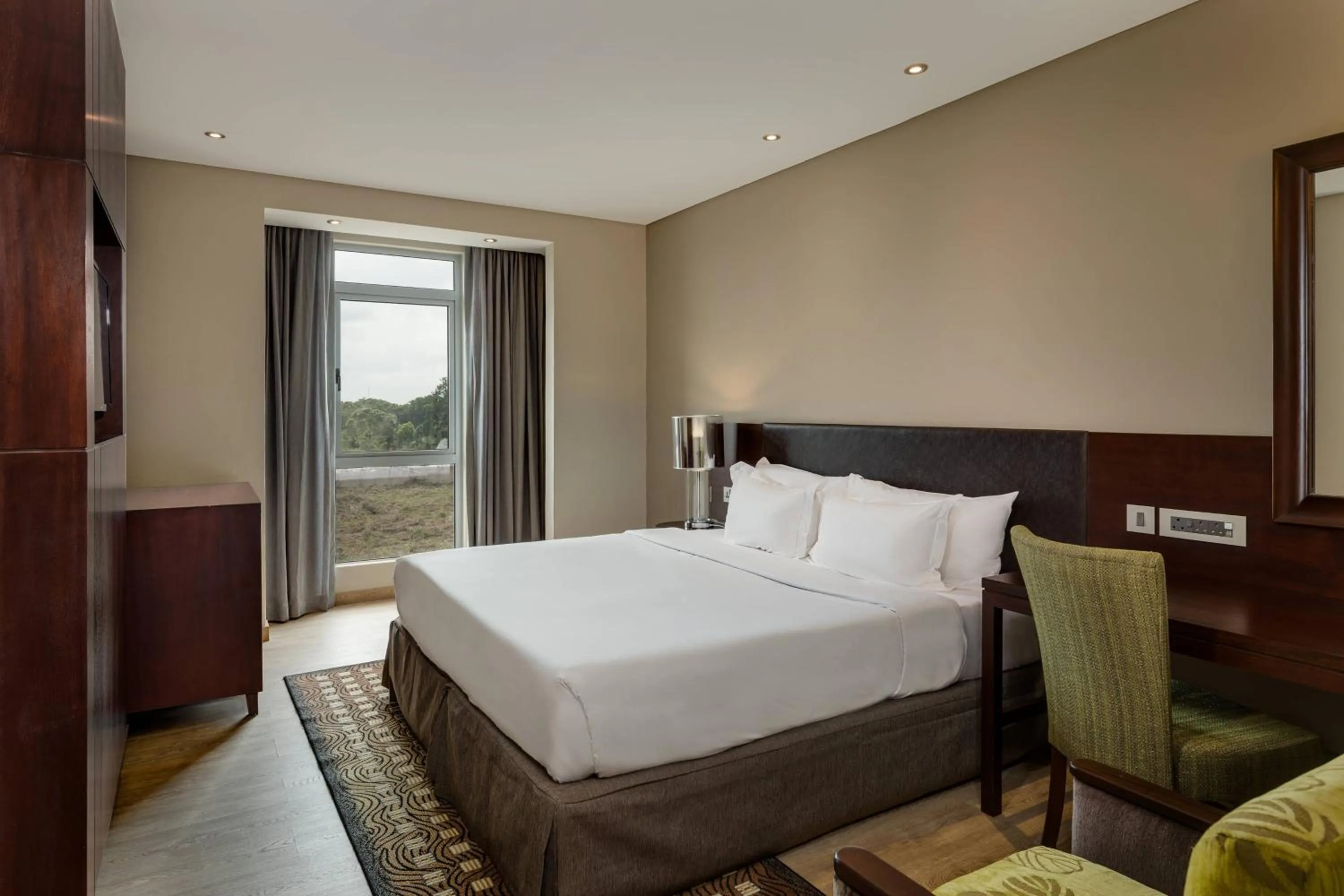 Photo of the whole room, Bed in Protea Hotel by Marriott Owerri Select