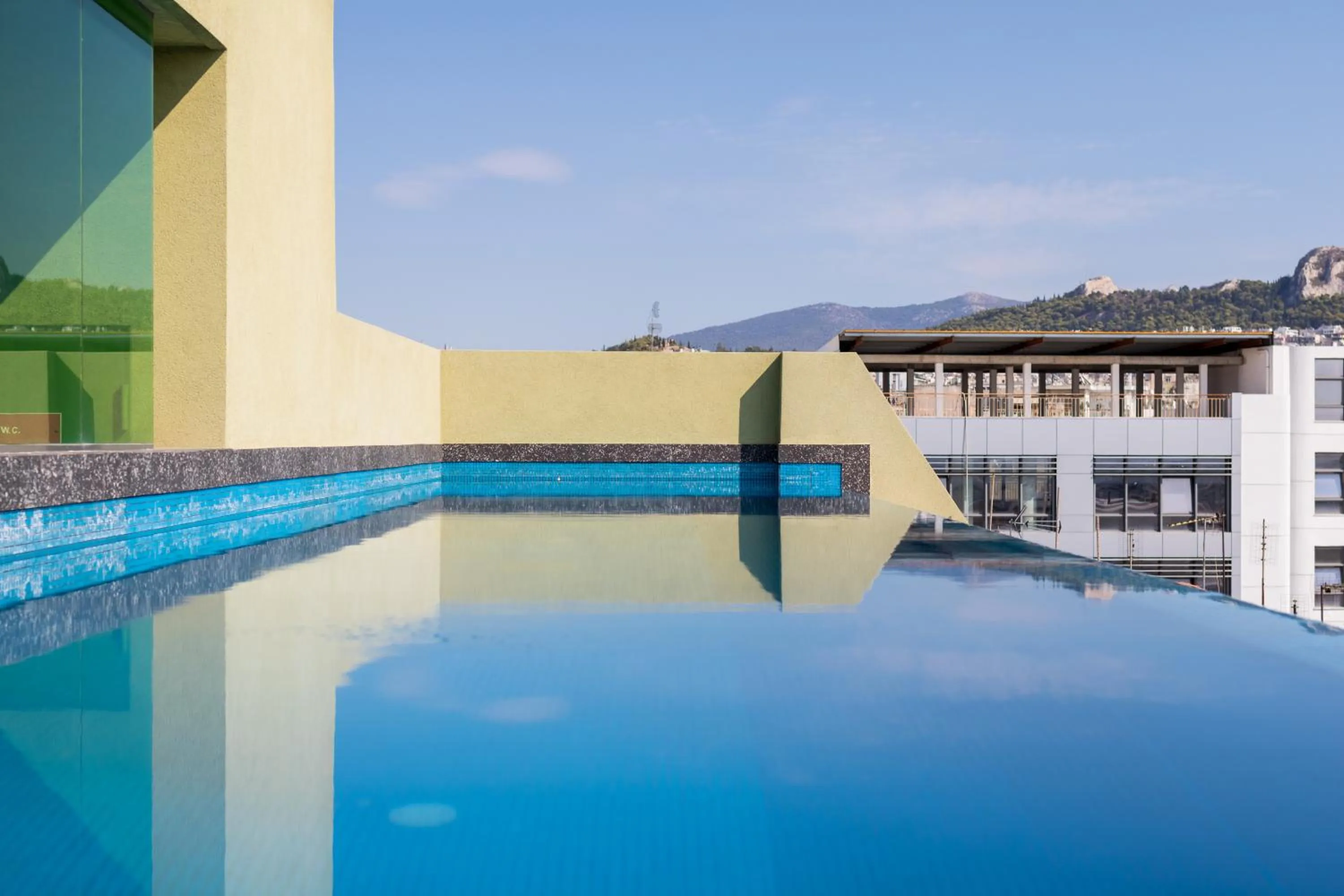 Swimming pool in Athens Mosaico Suites & Apartments