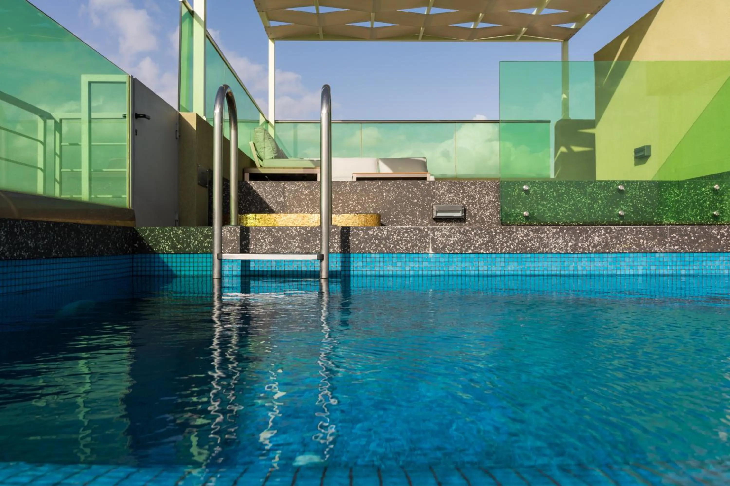 Swimming pool in Athens Mosaico Suites & Apartments