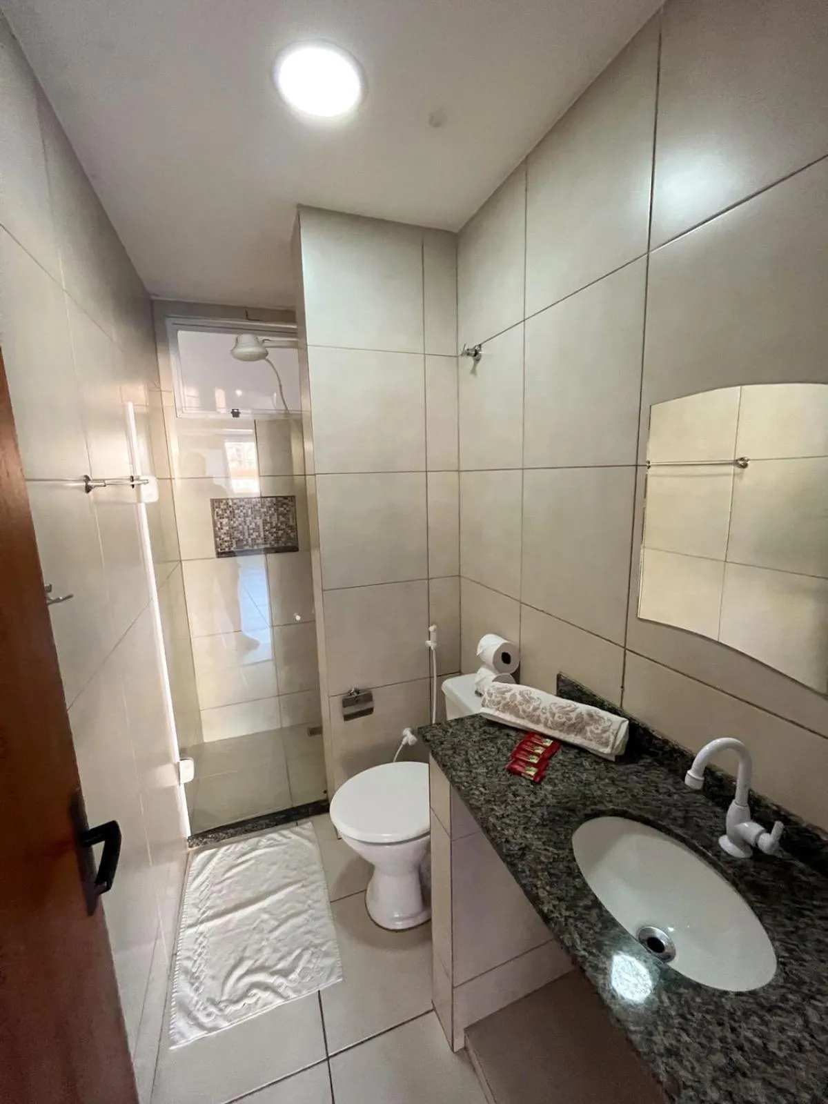 Toilet in Pousada Loft Praia dos Anjos