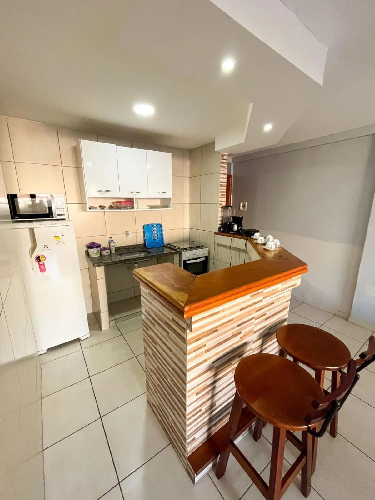 kitchen in Pousada Loft Praia dos Anjos