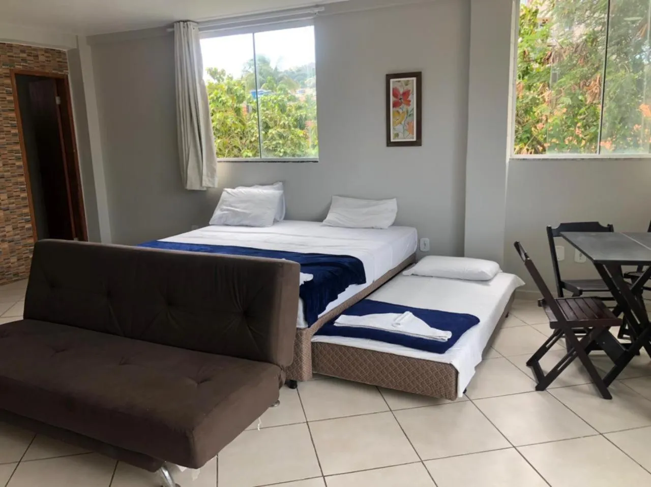 Photo of the whole room, Bed in Pousada Loft Praia dos Anjos
