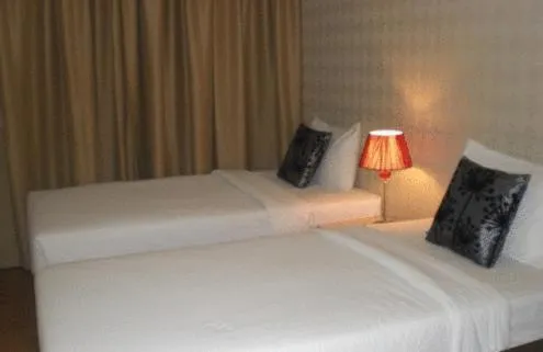 Bed in The Blooms Residence