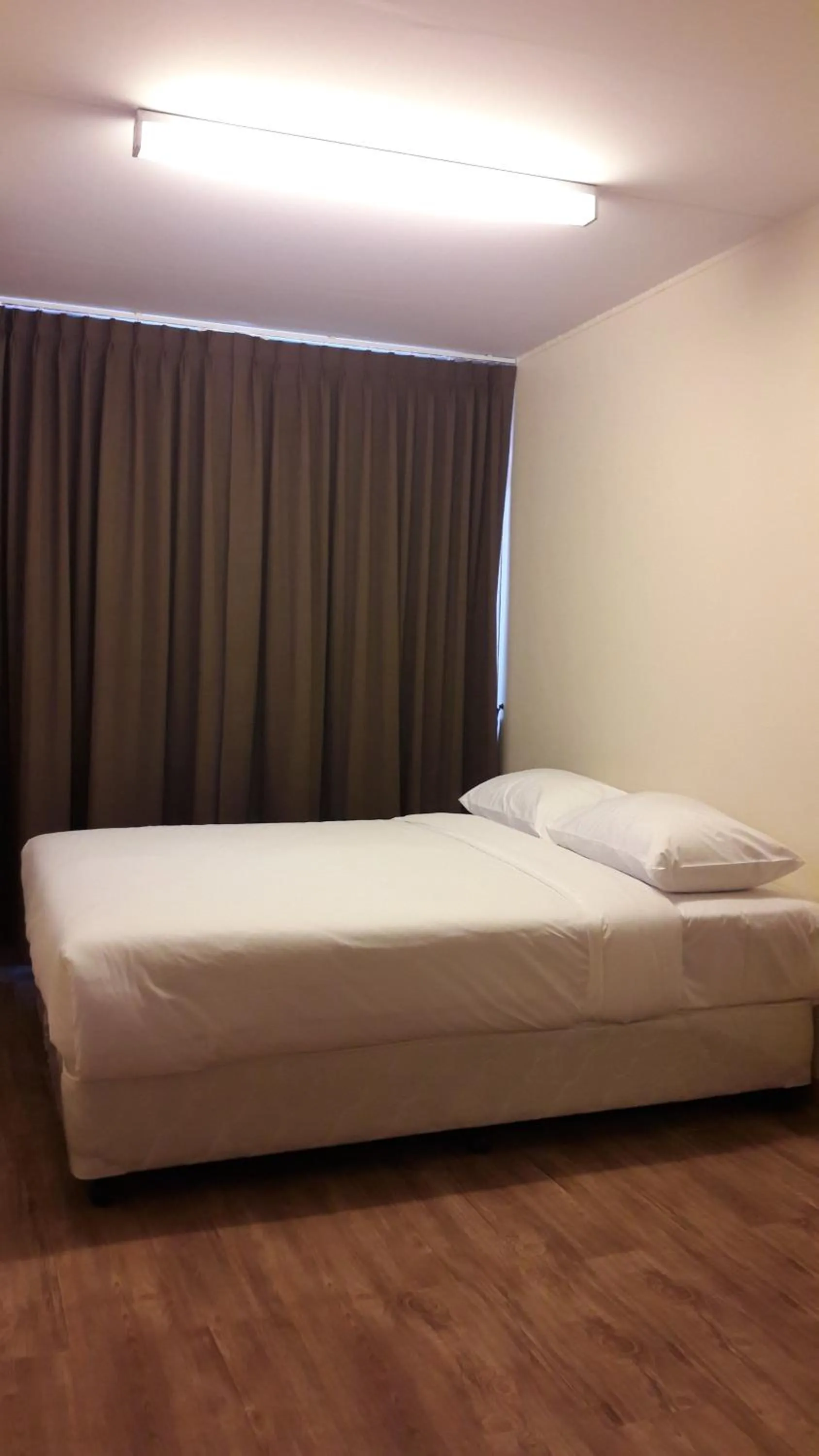 Bed in The Blooms Residence