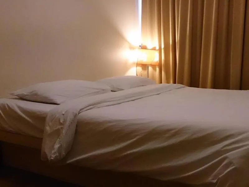 Bed in The Blooms Residence