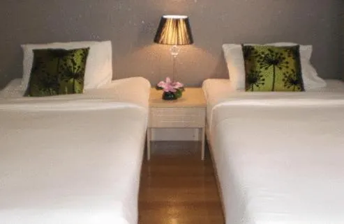 Bed in The Blooms Residence