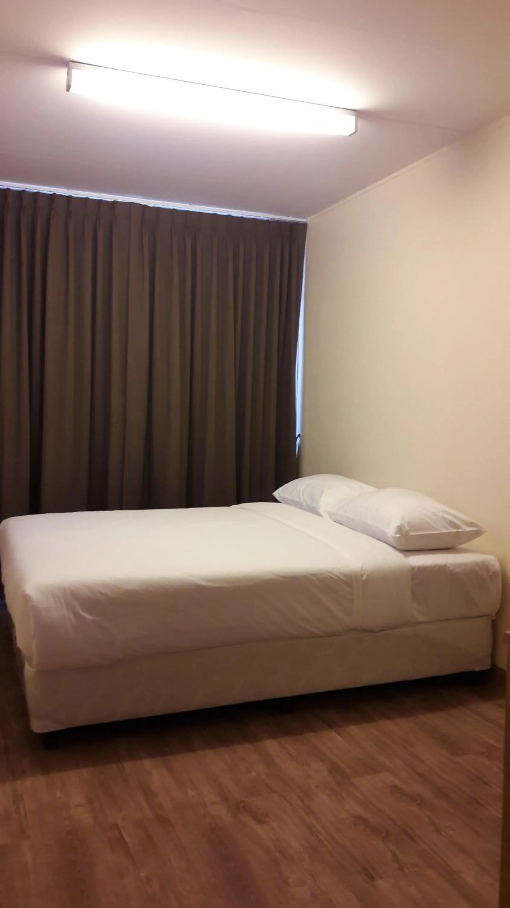 Bed in The Blooms Residence