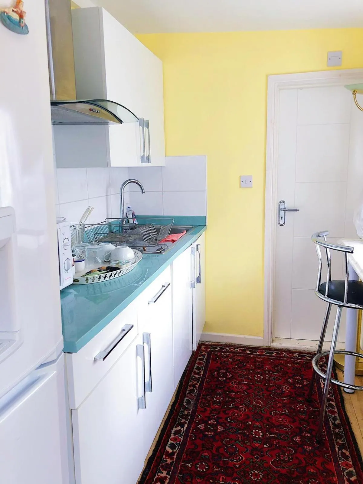 Kitchen or kitchenette in Caspian Hotel