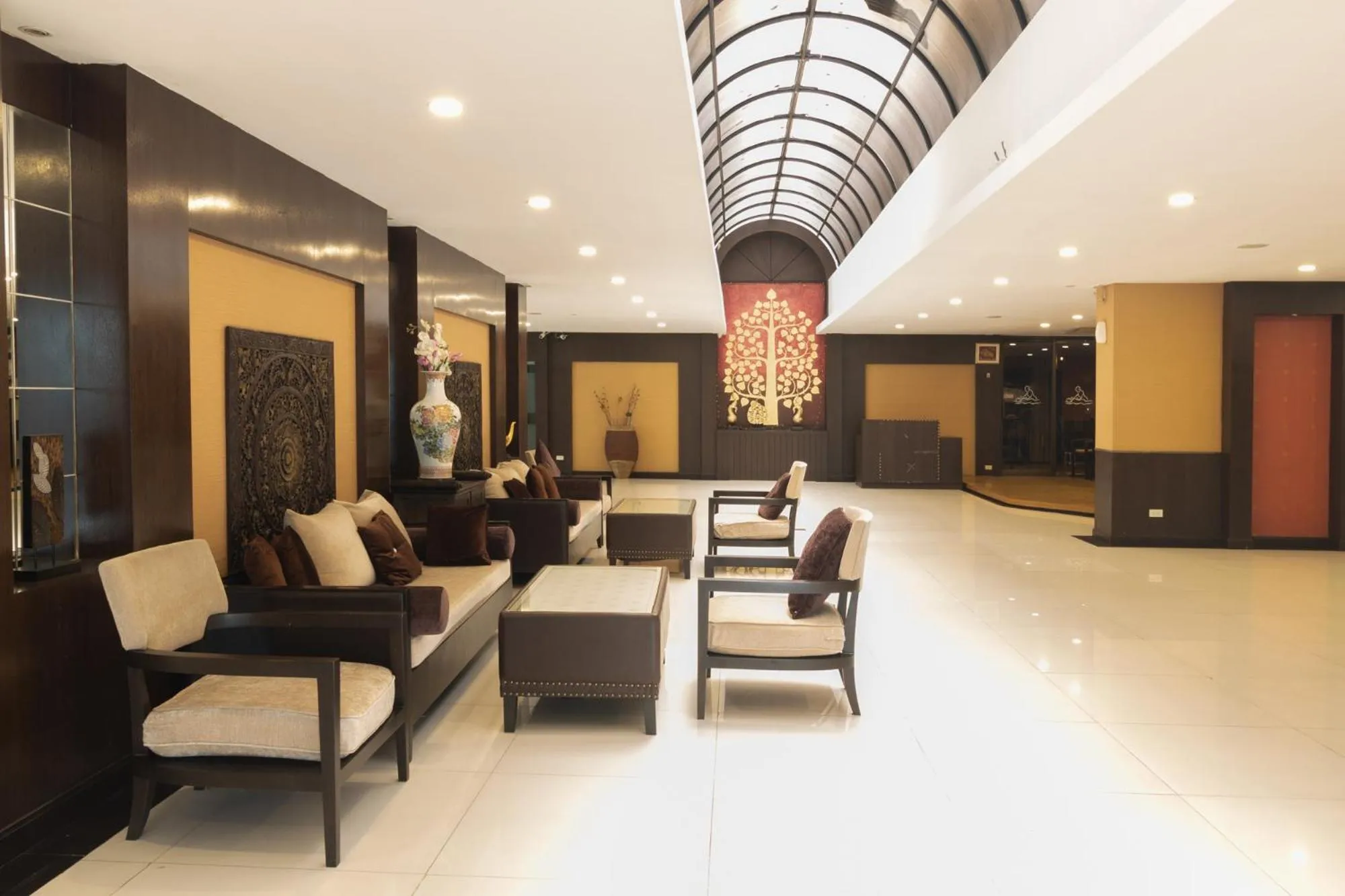 Seating area in Boss Suites Nana Hotel