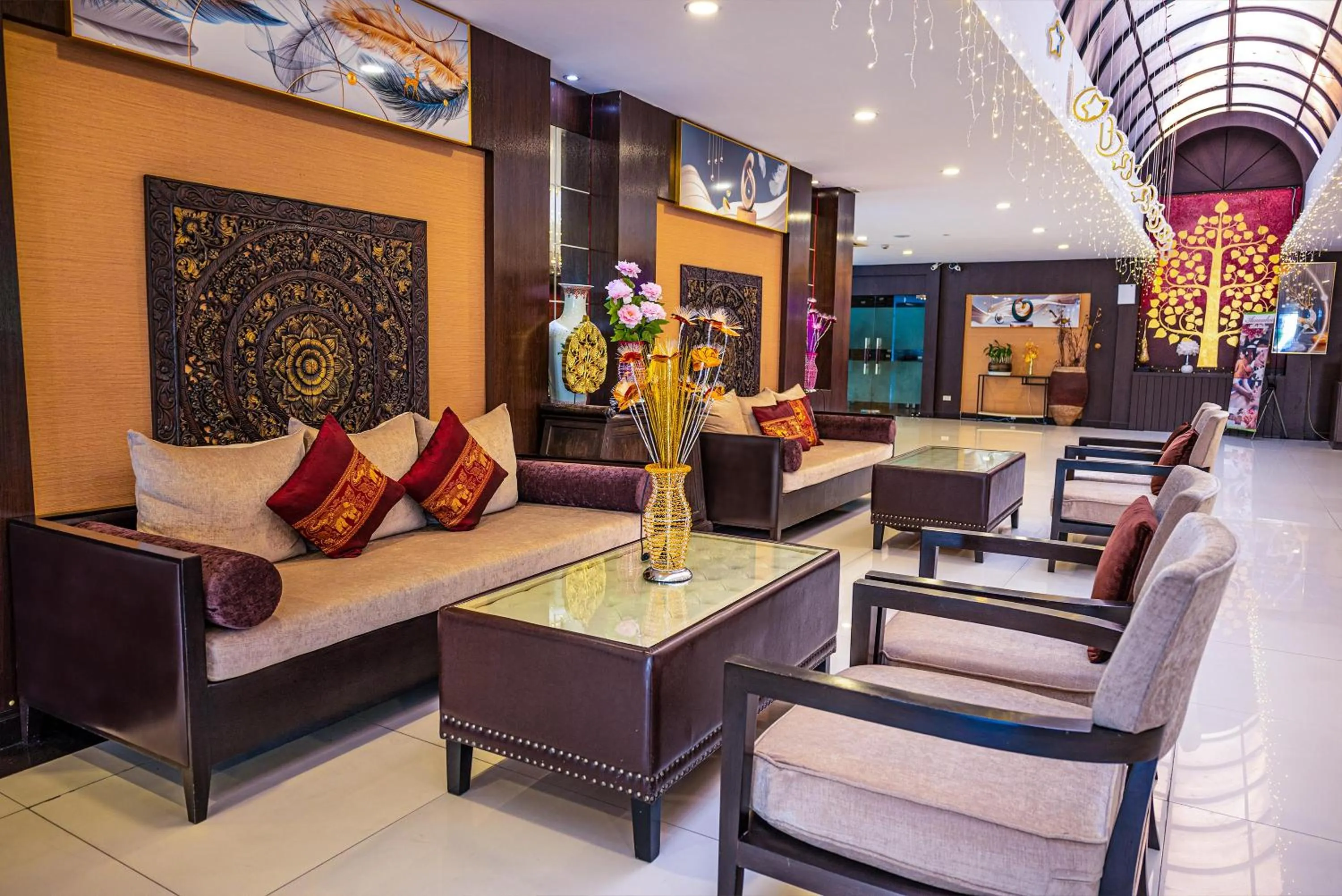 Seating area in Boss Suites Nana Hotel