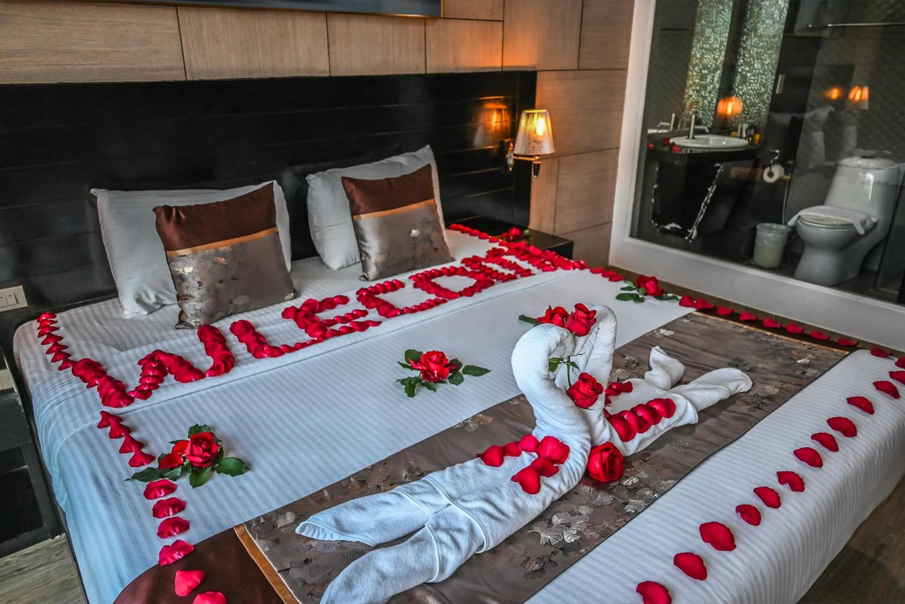 Bed in Boss Suites Nana Hotel